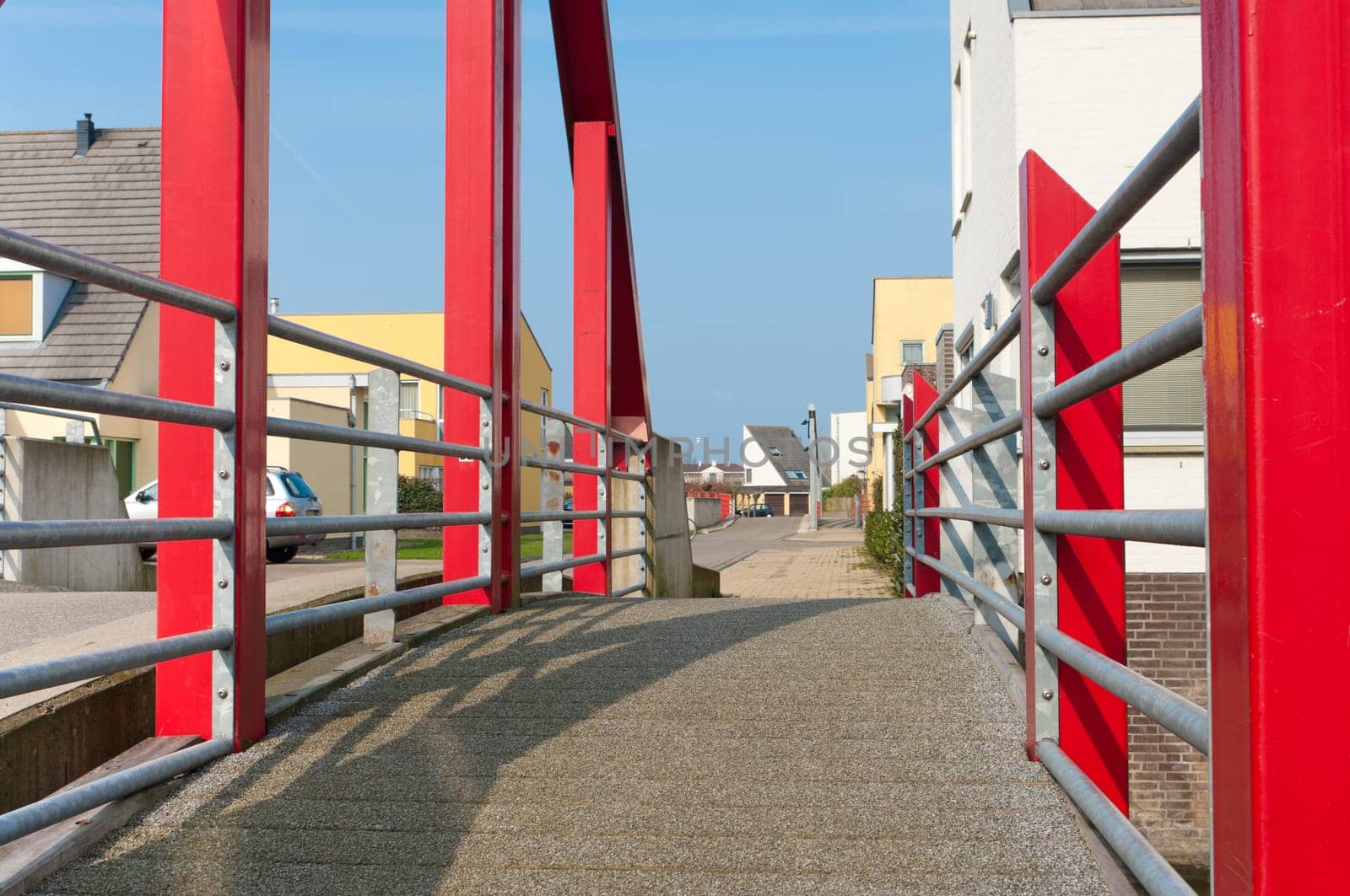 modern red footbridge in Beuningen, Netherlands