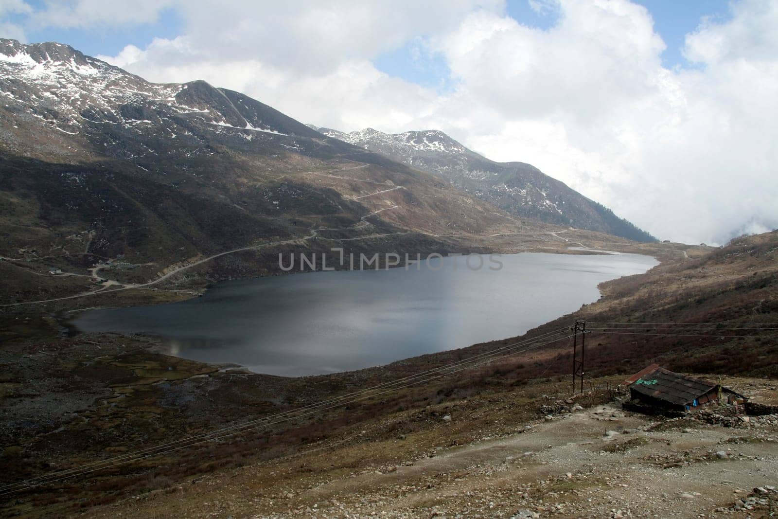 Lake on lap of mountain at high altitude, 60 km away from Ganktok, Sikkim, India, Asia