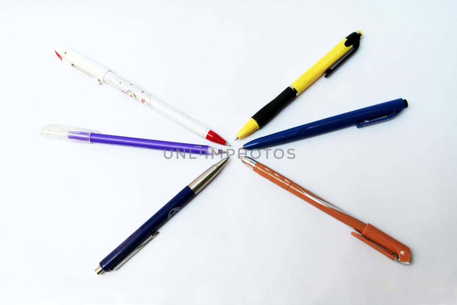 Set of ball pens of different colours isolated on white