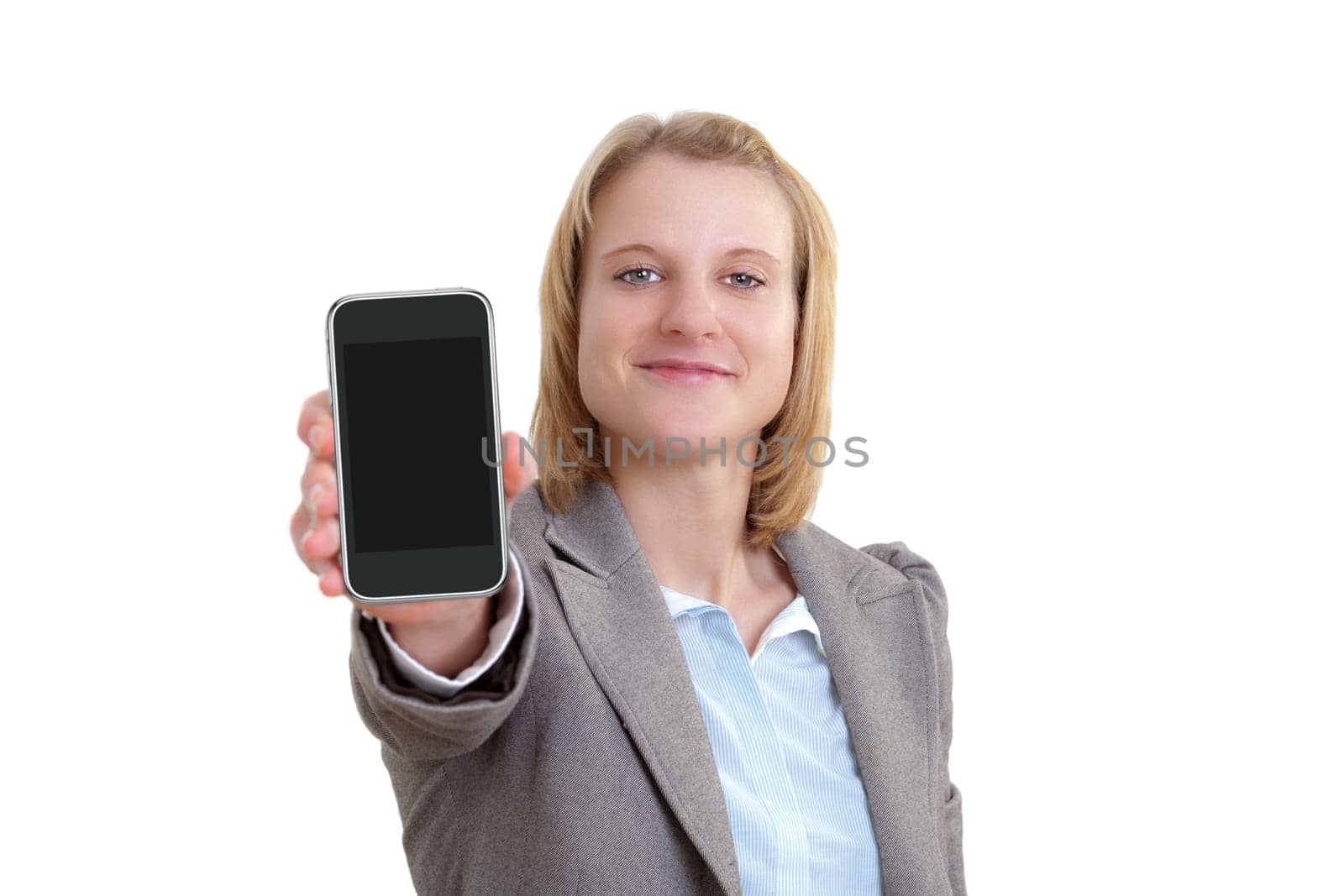 Young woman holding smart phone at camera