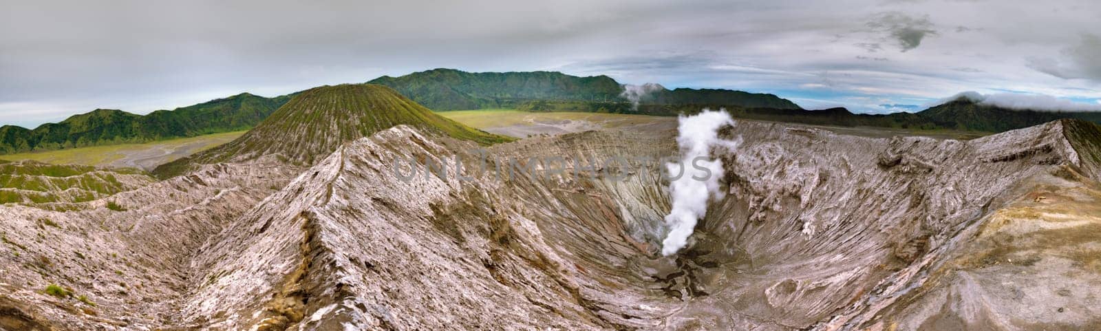 Crater of volcano Bromo at sunrise time. Indonesia