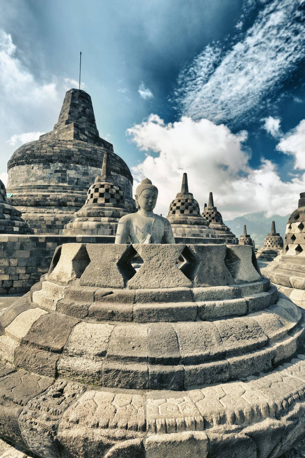 Buddha statue in stupa. Borobudur. Java. Indonesia
