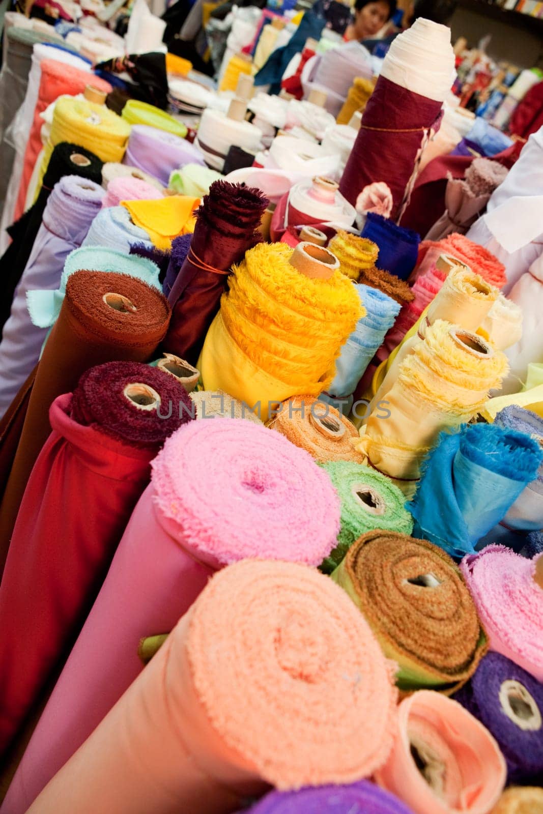 Rolld of cloth at a textile store, bulk