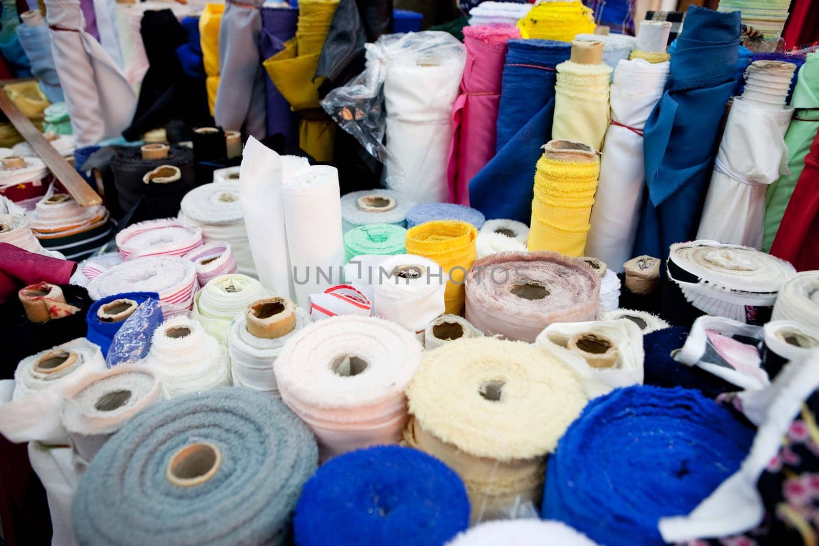 An abstract background of various rolls of cloth