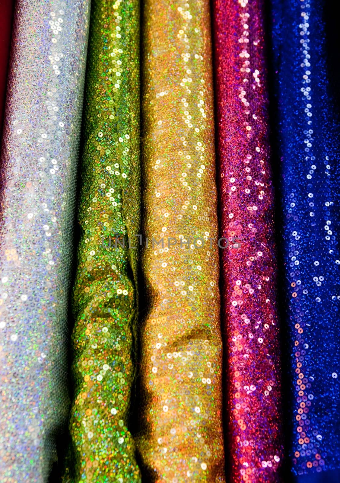 An abstract background of various rolls of cloth