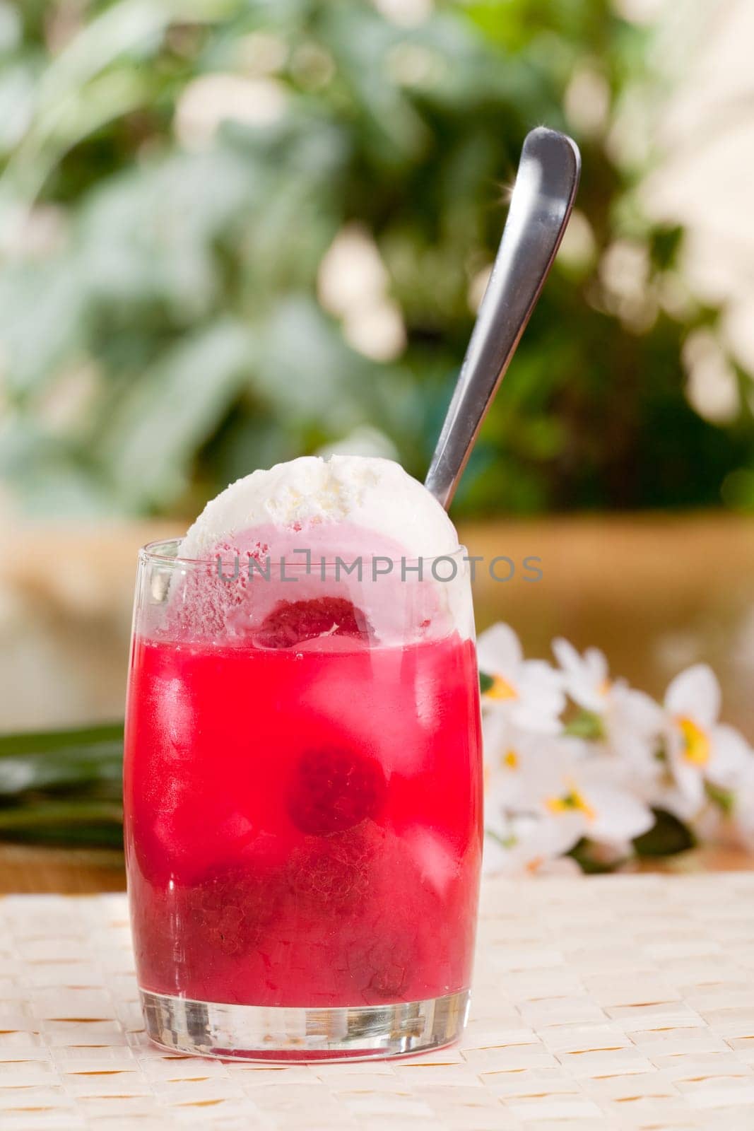 A raspberry float in an outdoor setting