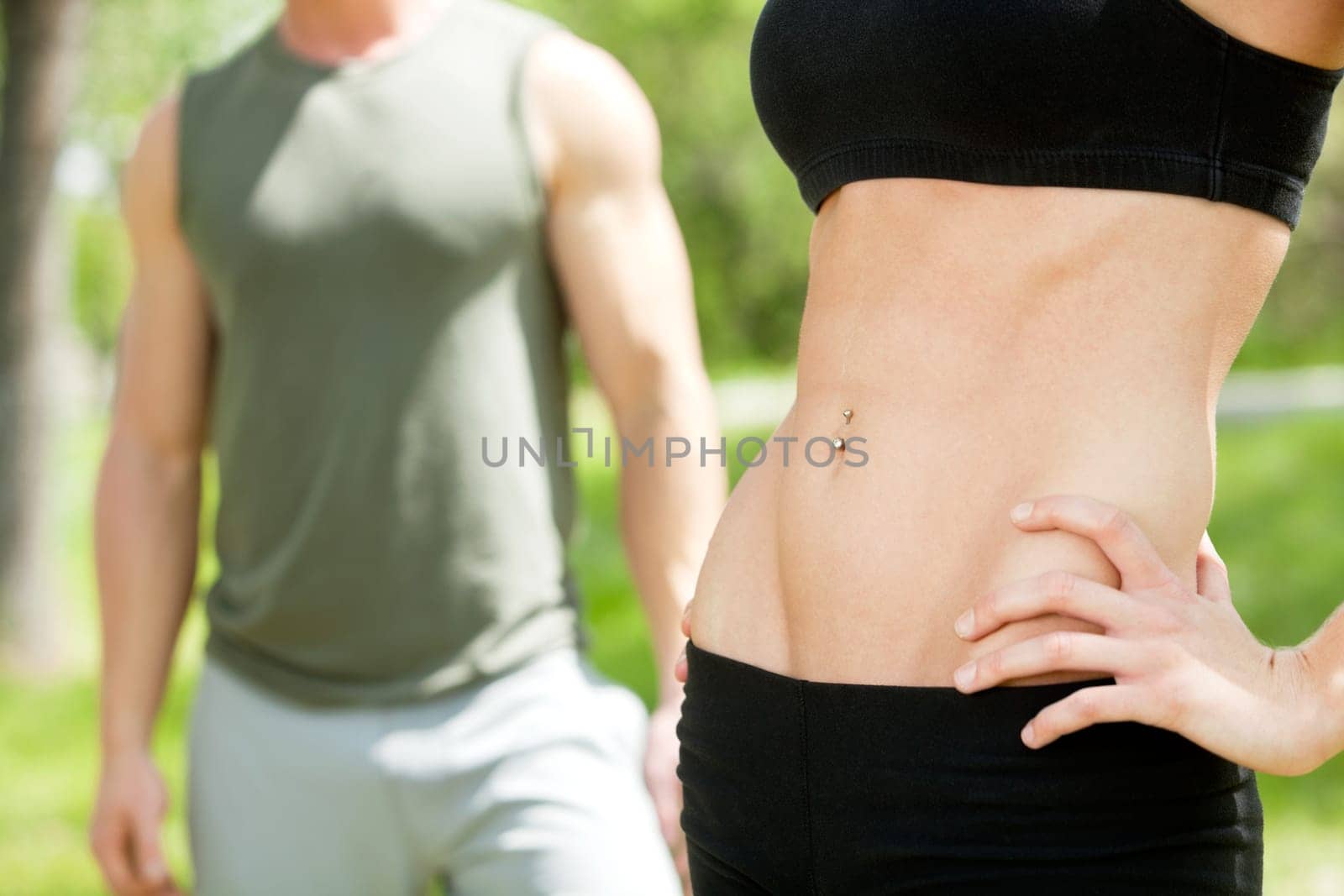Mid section of man and woman against white background
