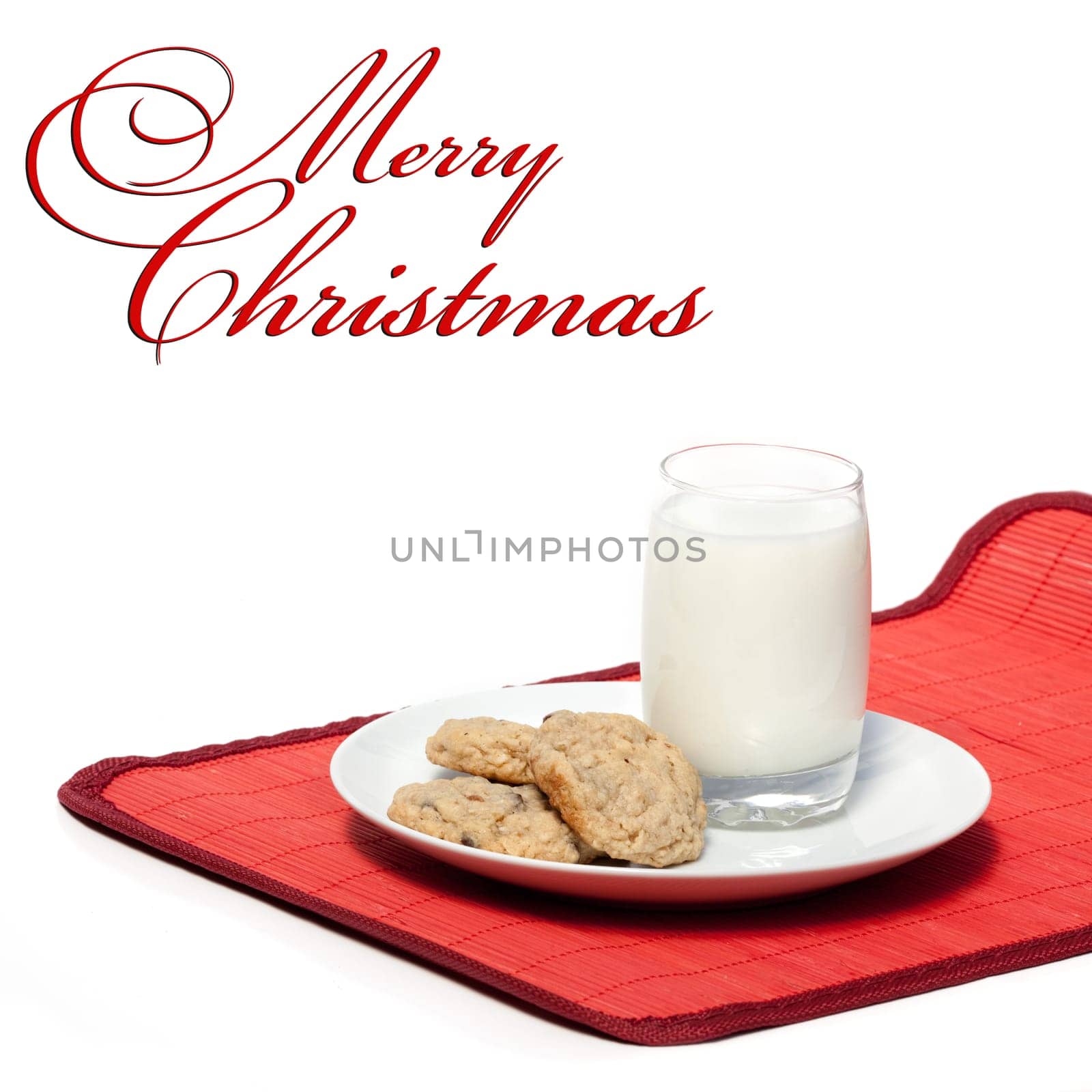 Milk and cookies - a typical christmas snack with a Merry Christmas copy space