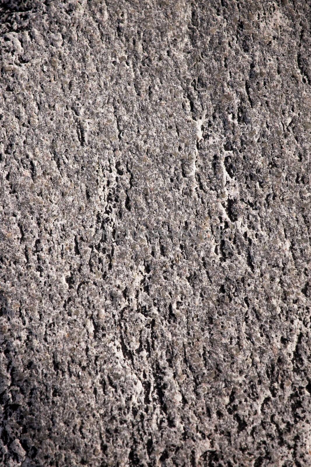 A dark grey an black stone texture