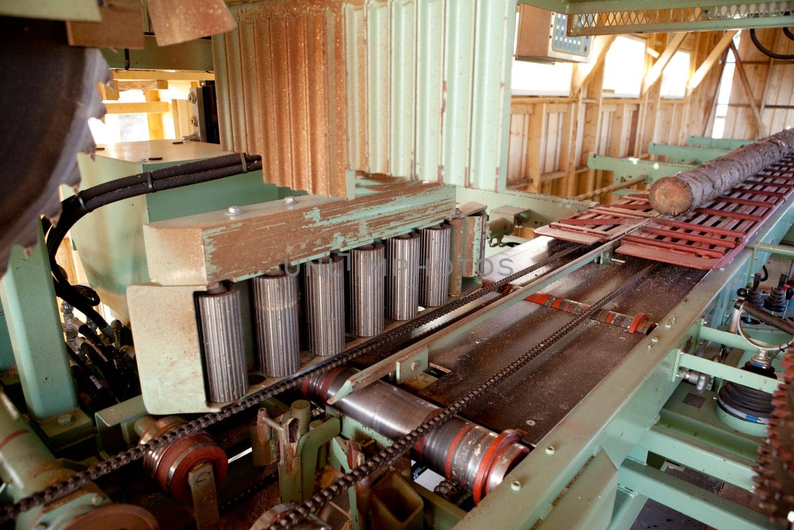 A lumber mill detail showing a log ready to be cut