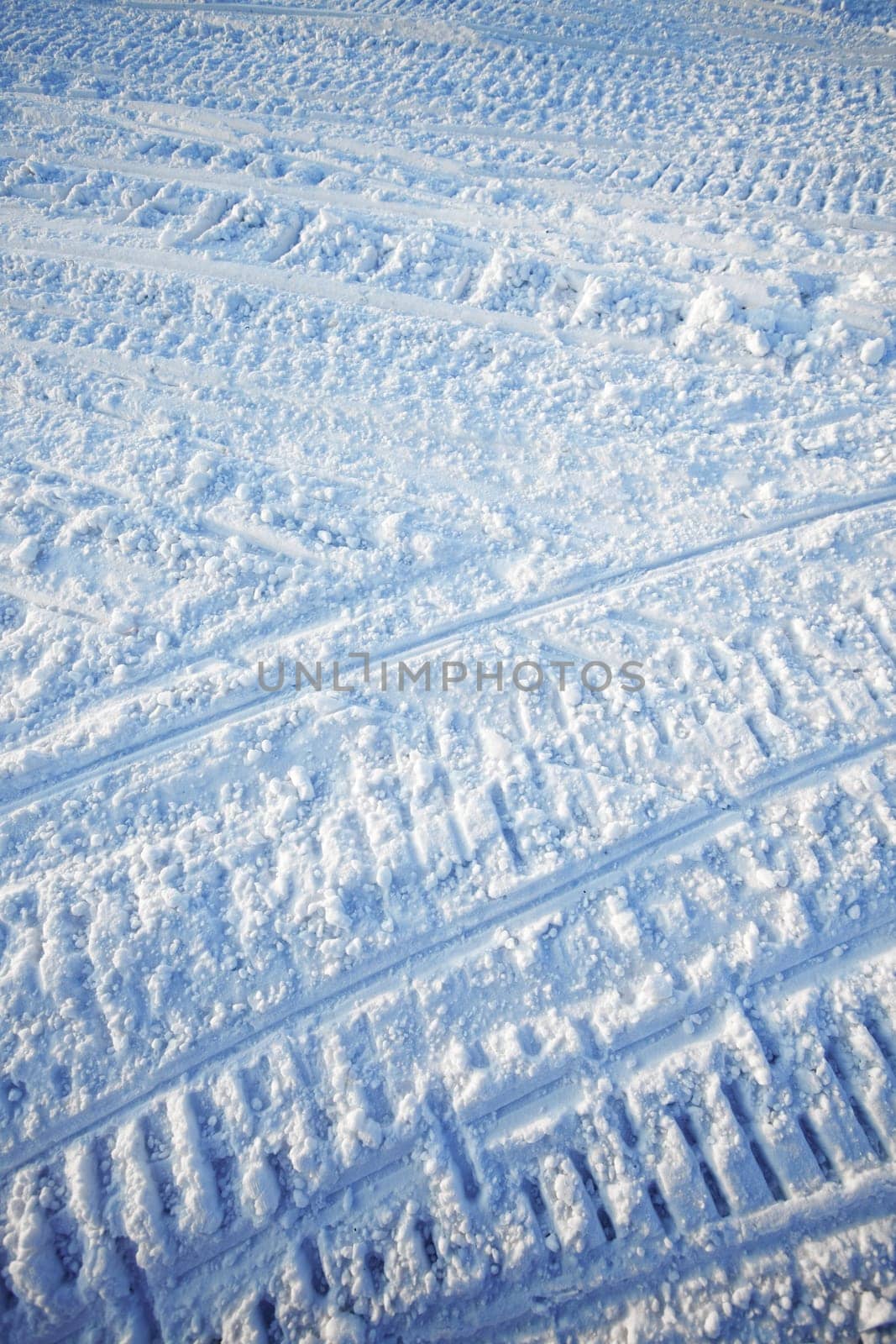 A snow texture created on a snowmobile road