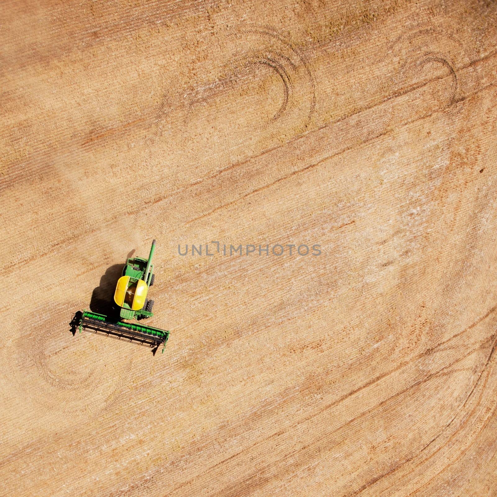 Background texture pattern of a combine finishing a field of lentils