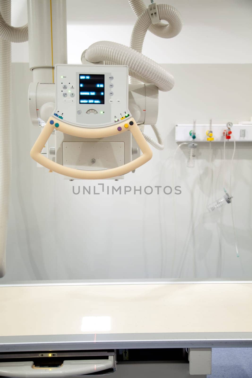 A detail of a table x-ray machine in a hospital