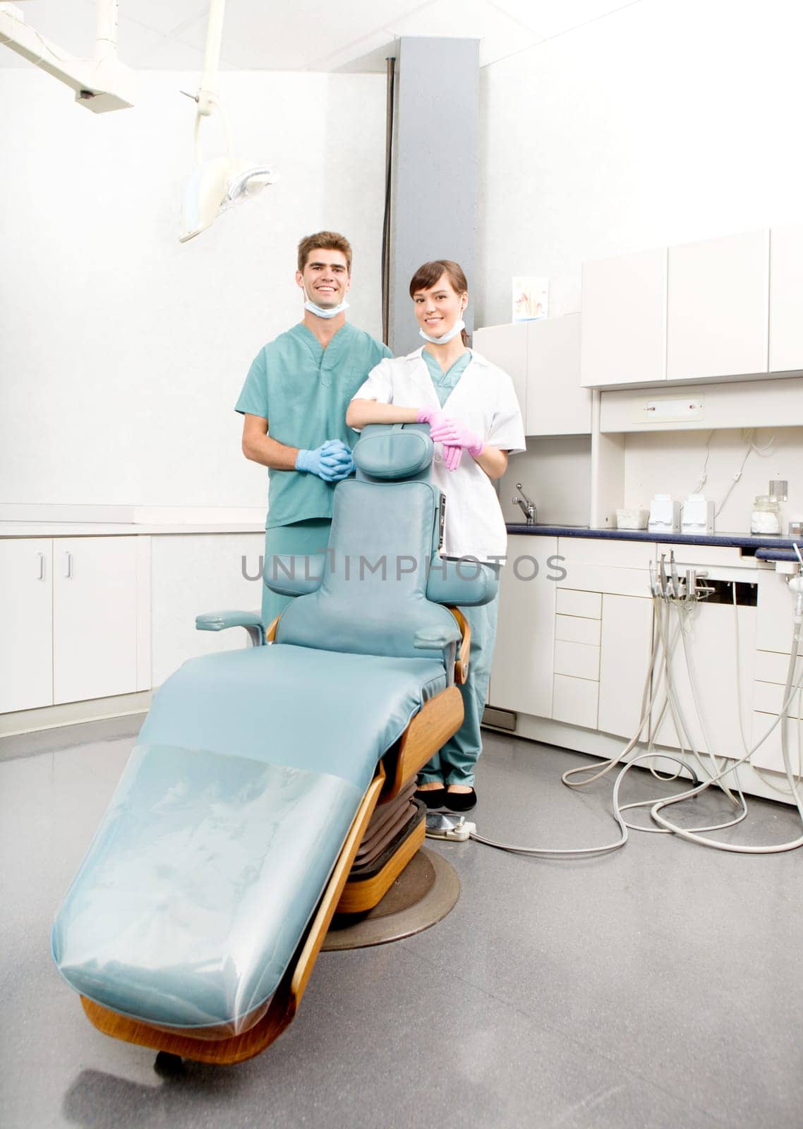 A happy dental team, dentist and assistant in a dental clinic