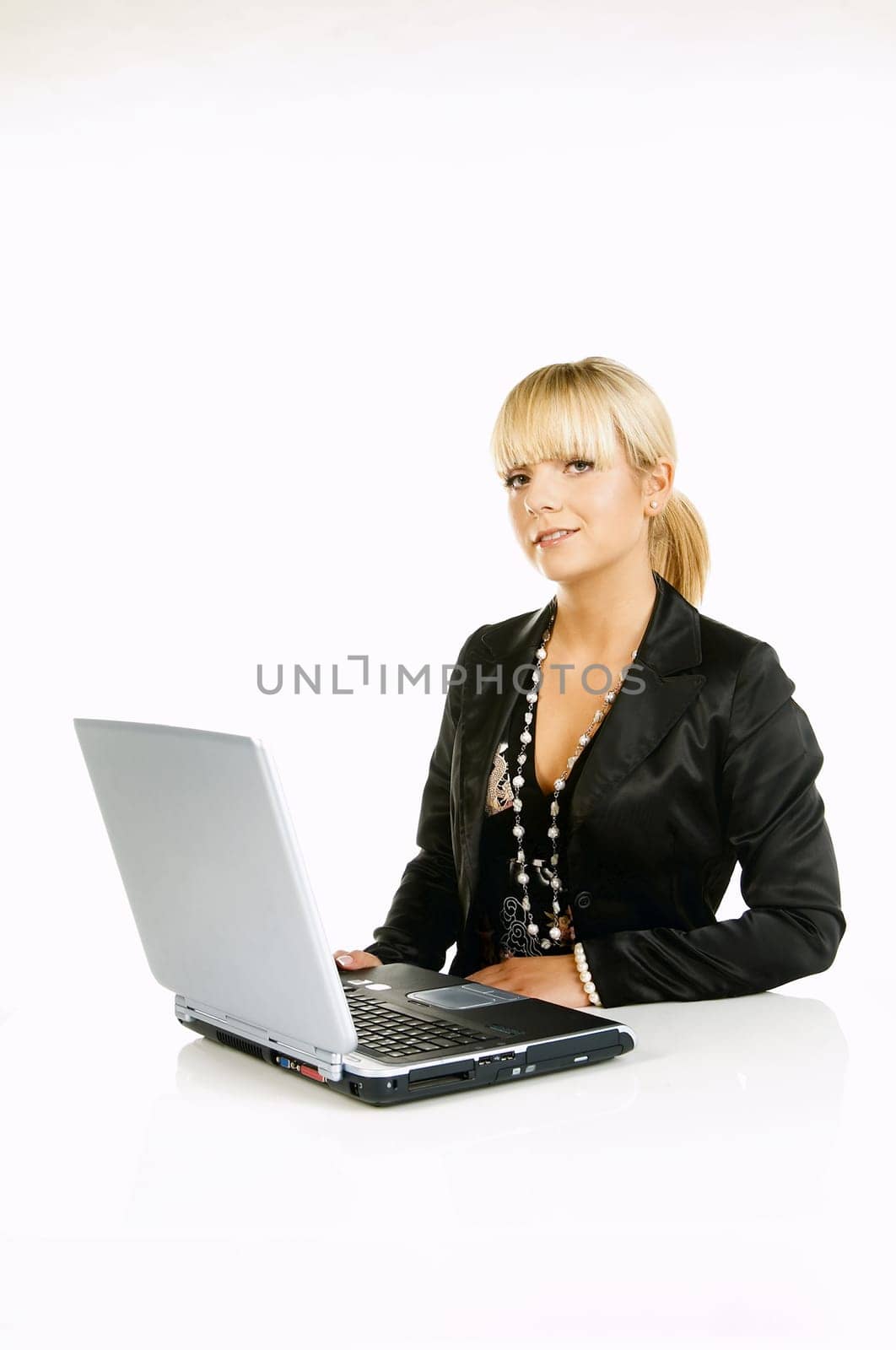 Sexy Beautiful Business women with laptop computer isolated on white