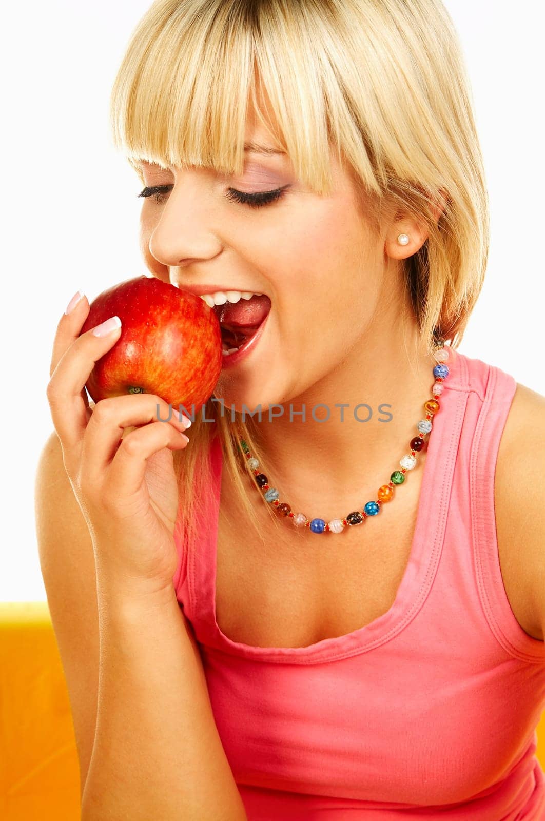 Happy beautiful women with red apple