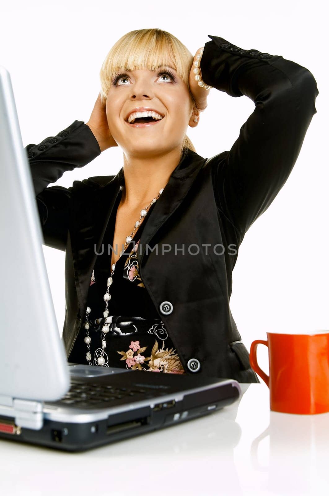 Sexy Beautiful Business women with laptop computer and coffee cup isolated on white