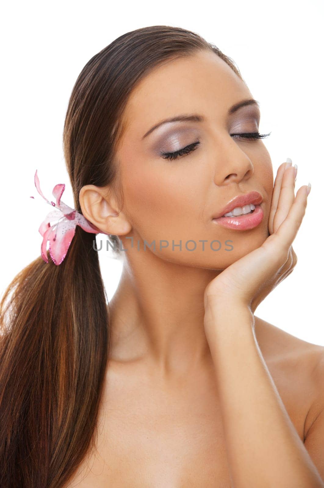 Portrait of beautiful young woman on white background