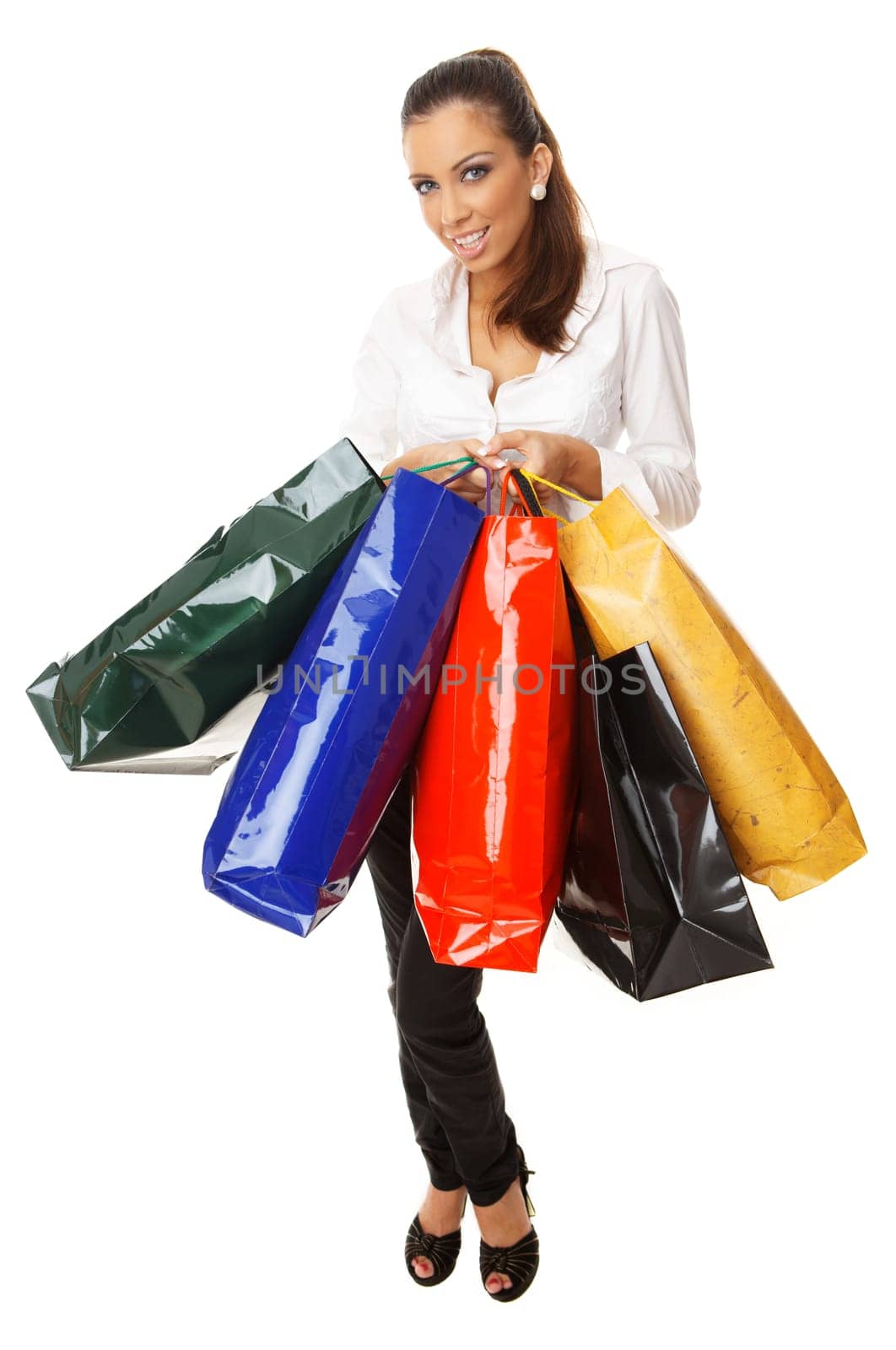 Young Attractive woman with paper shopping bags