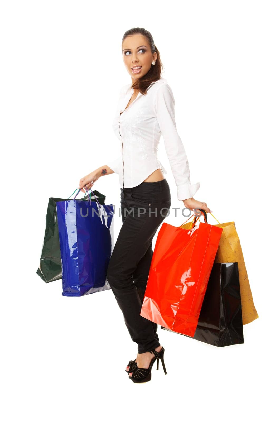 Young Attractive woman with paper shopping bags