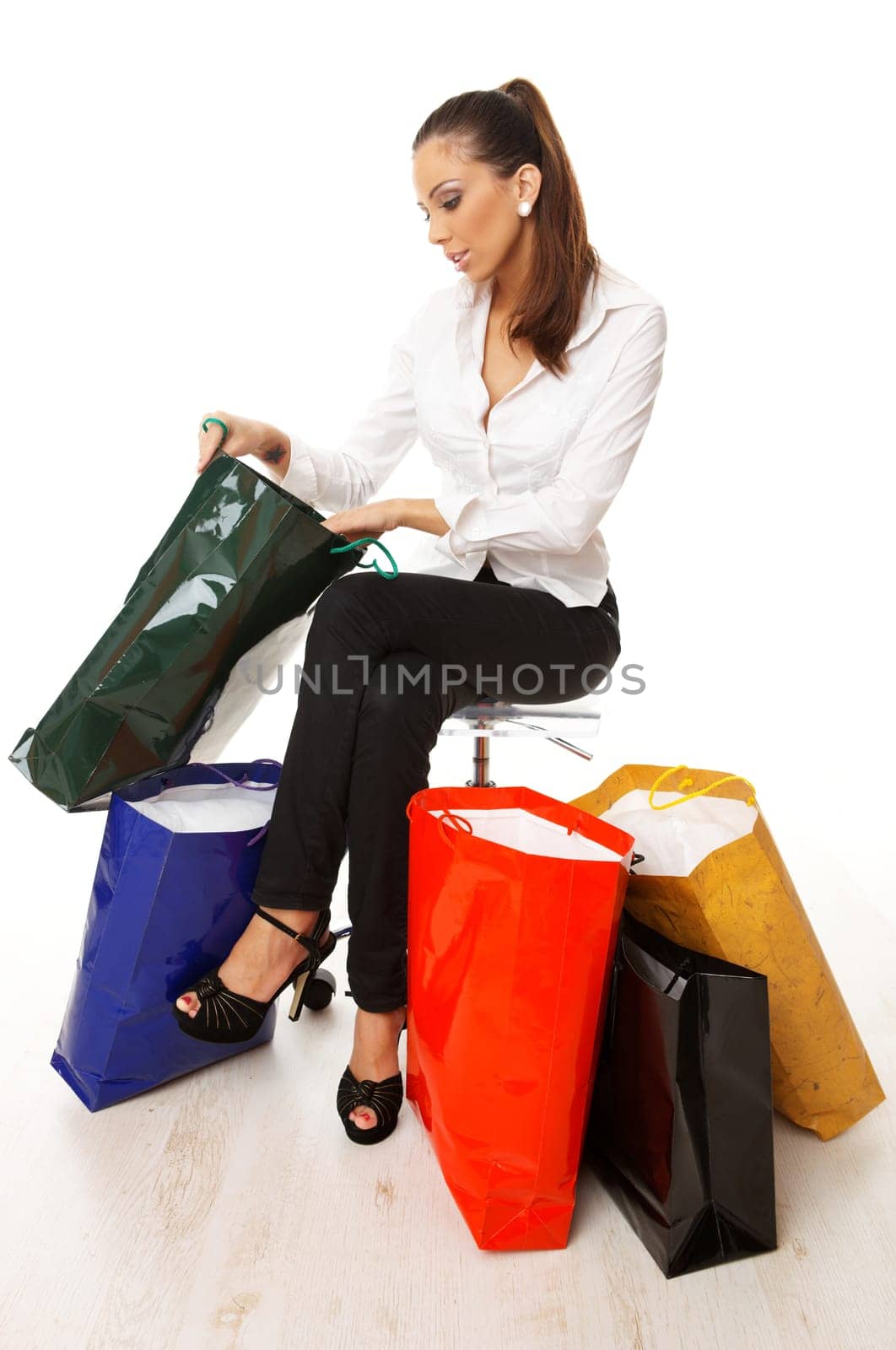 Attractive woman with paper shopping bags