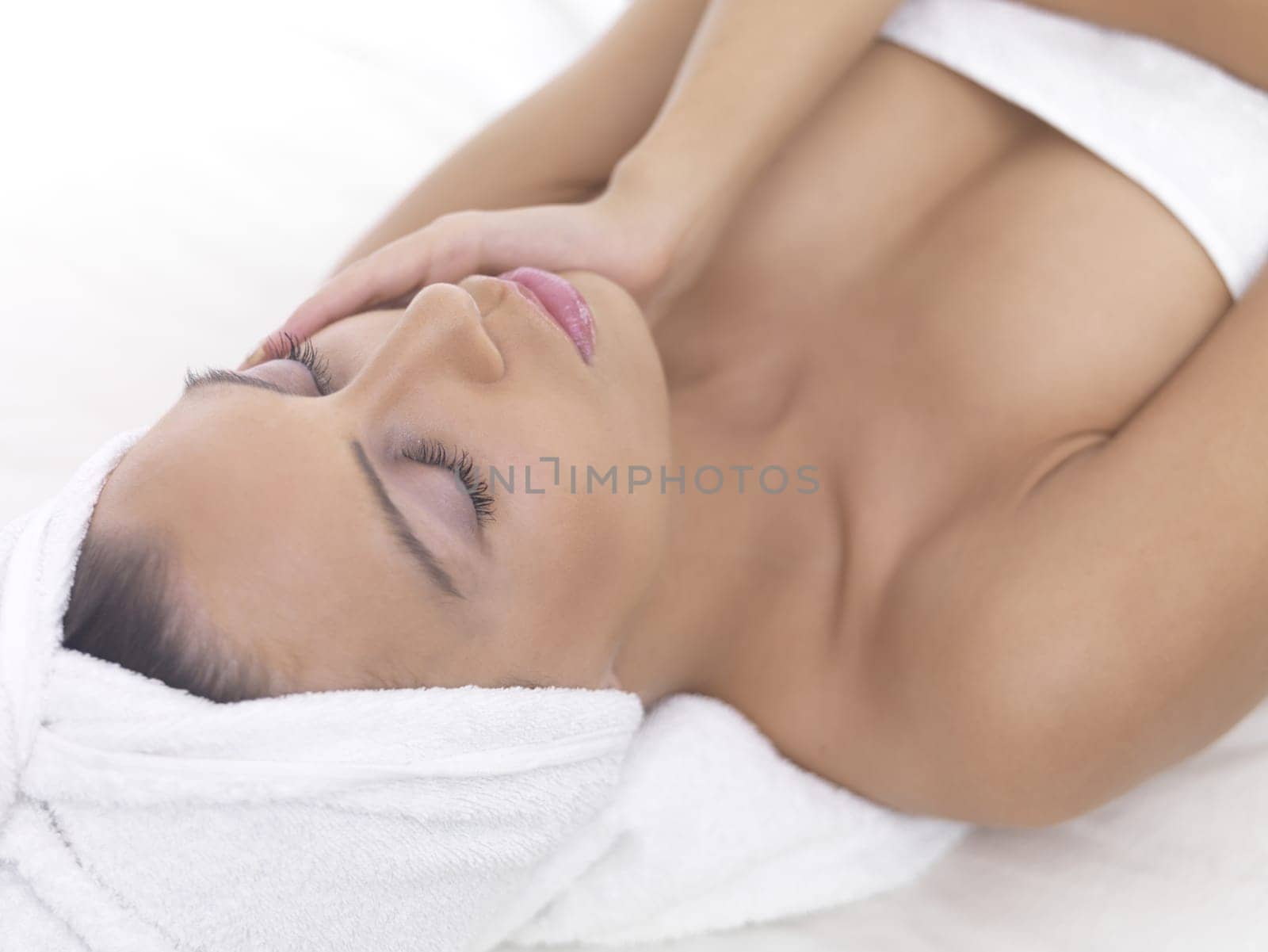 Portrait of beautiful woman during spa treatment