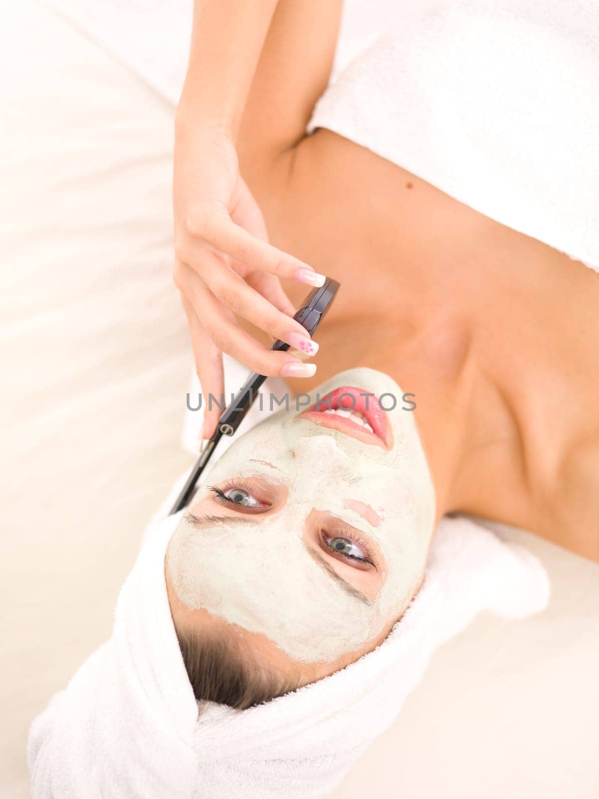 Portrait of beautiful woman during spa treatment