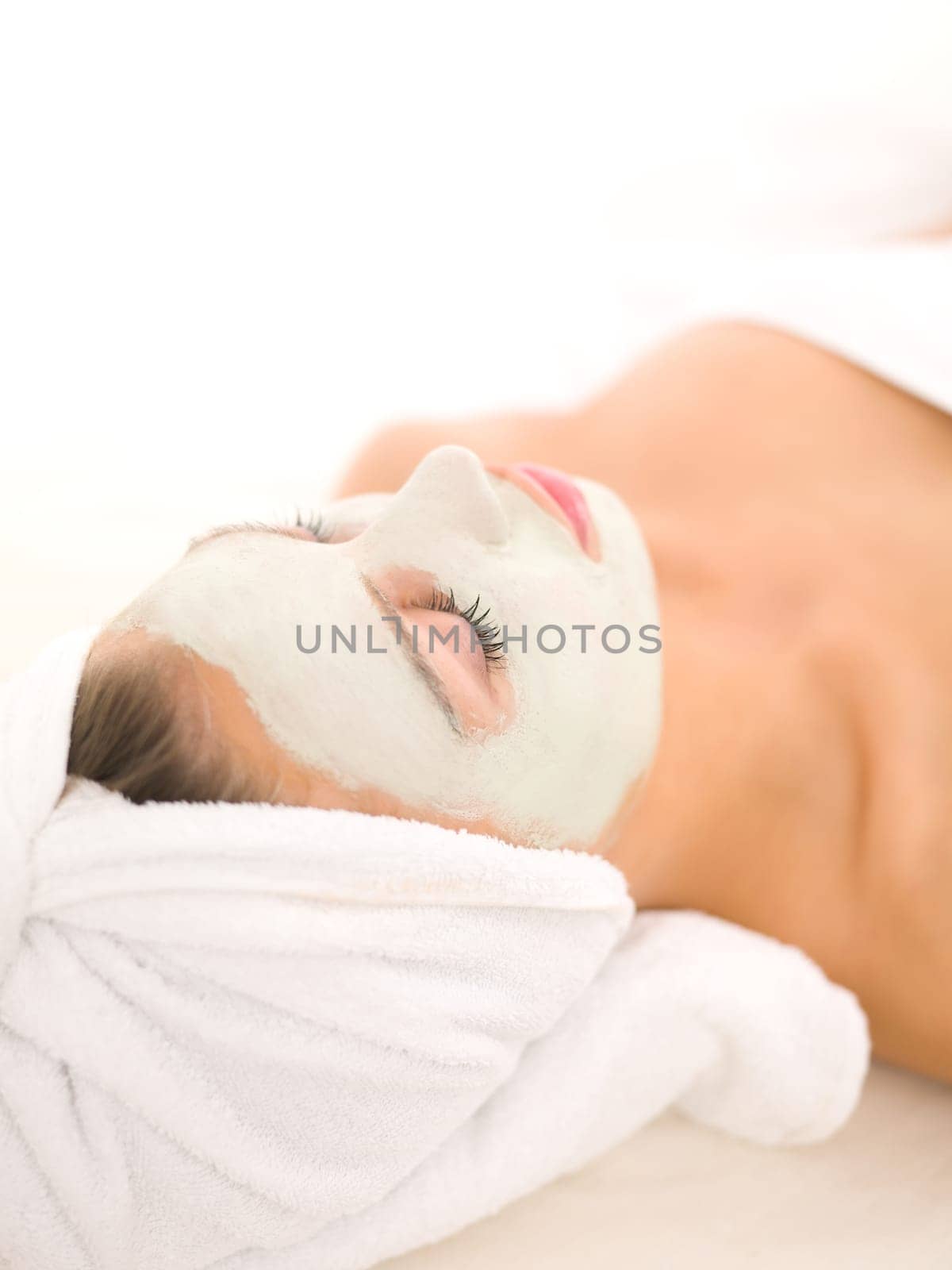 Portrait of beautiful woman during spa treatment