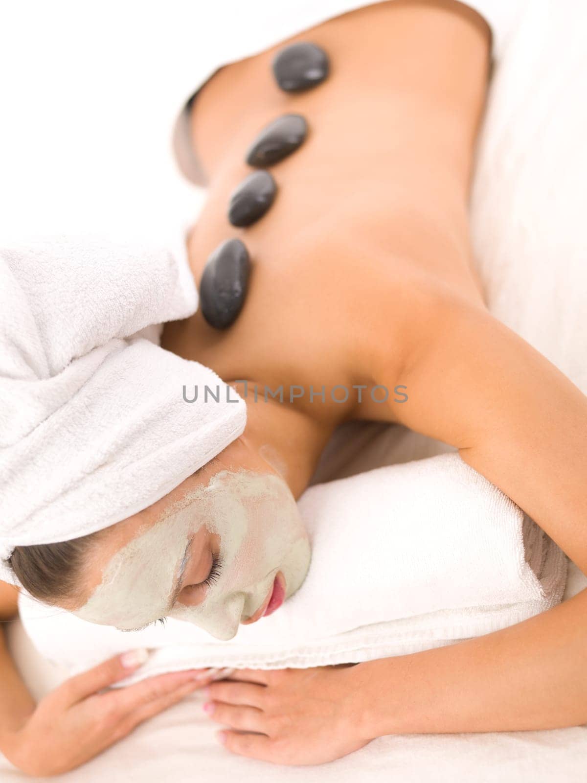 Portrait of beautiful woman during spa treatment