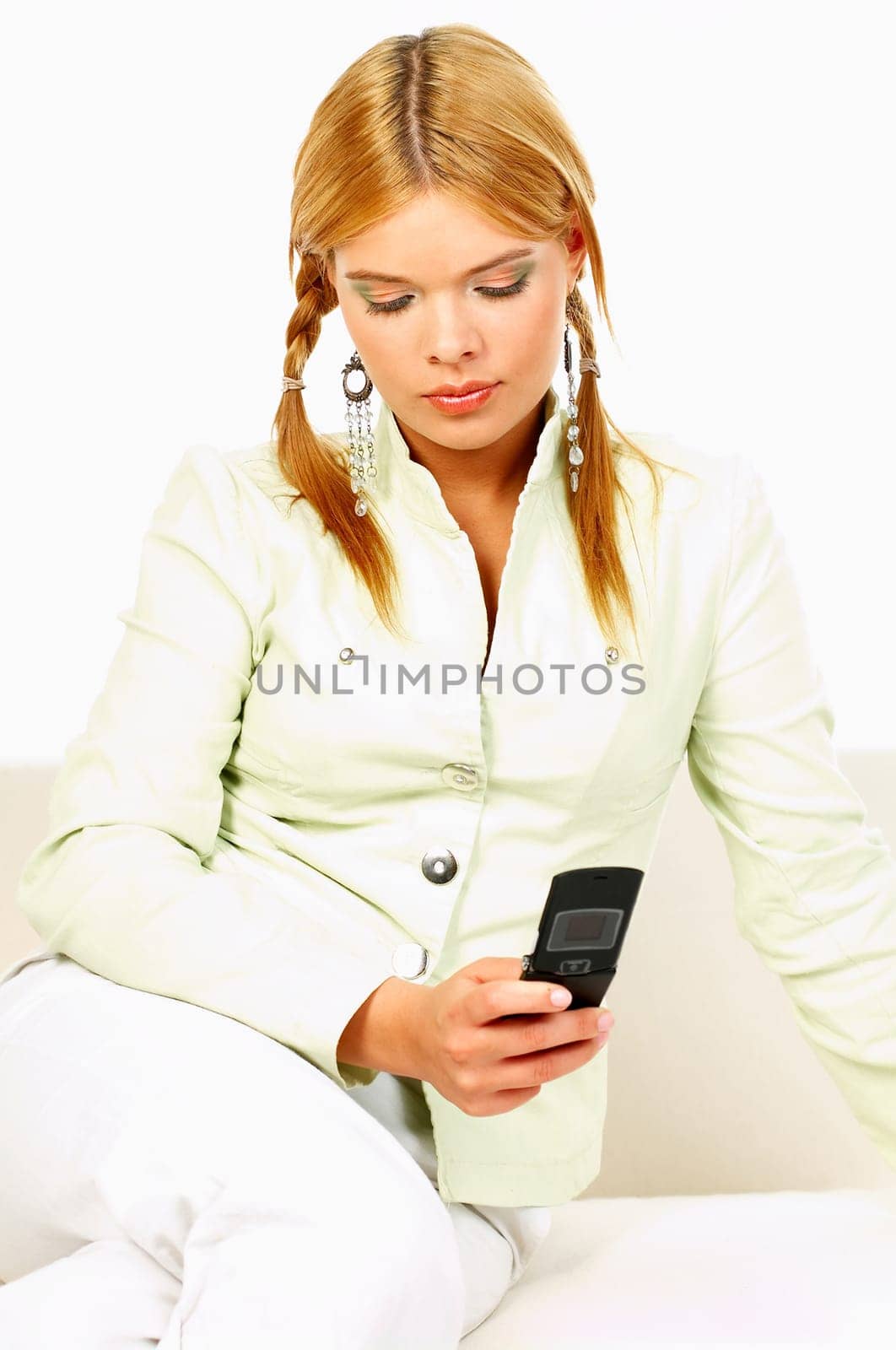 Portrait of attractive beautiful young woman with cell phone