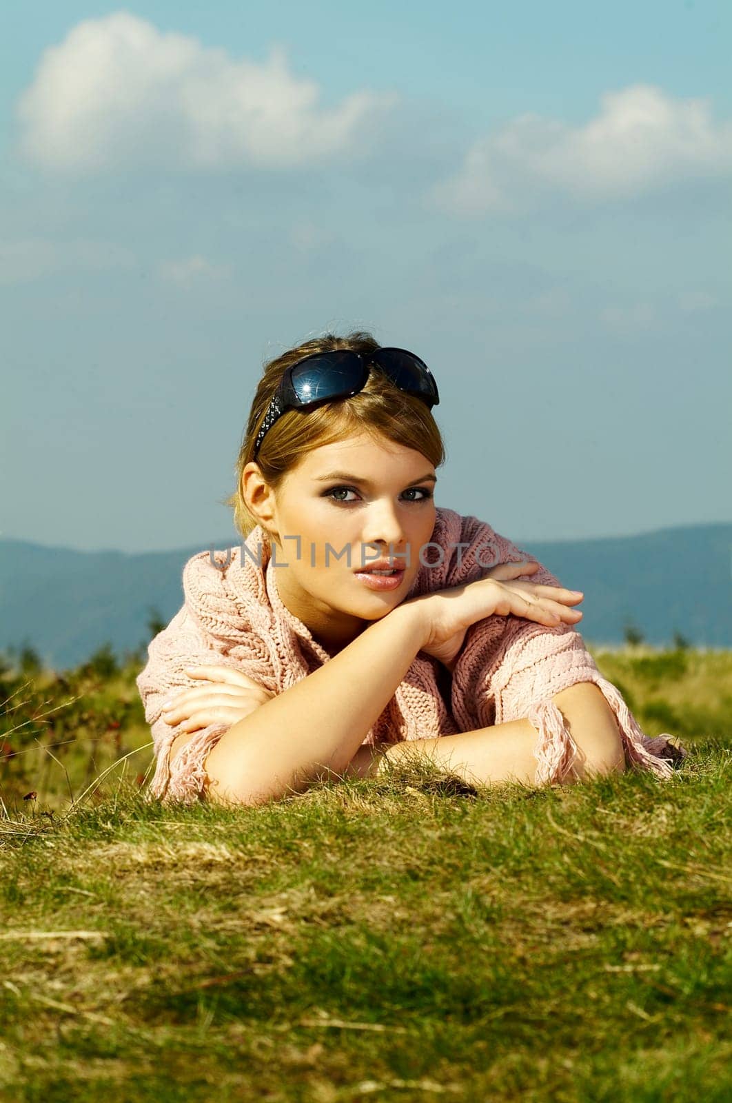 Young business woman relaxing on mountains outdoors