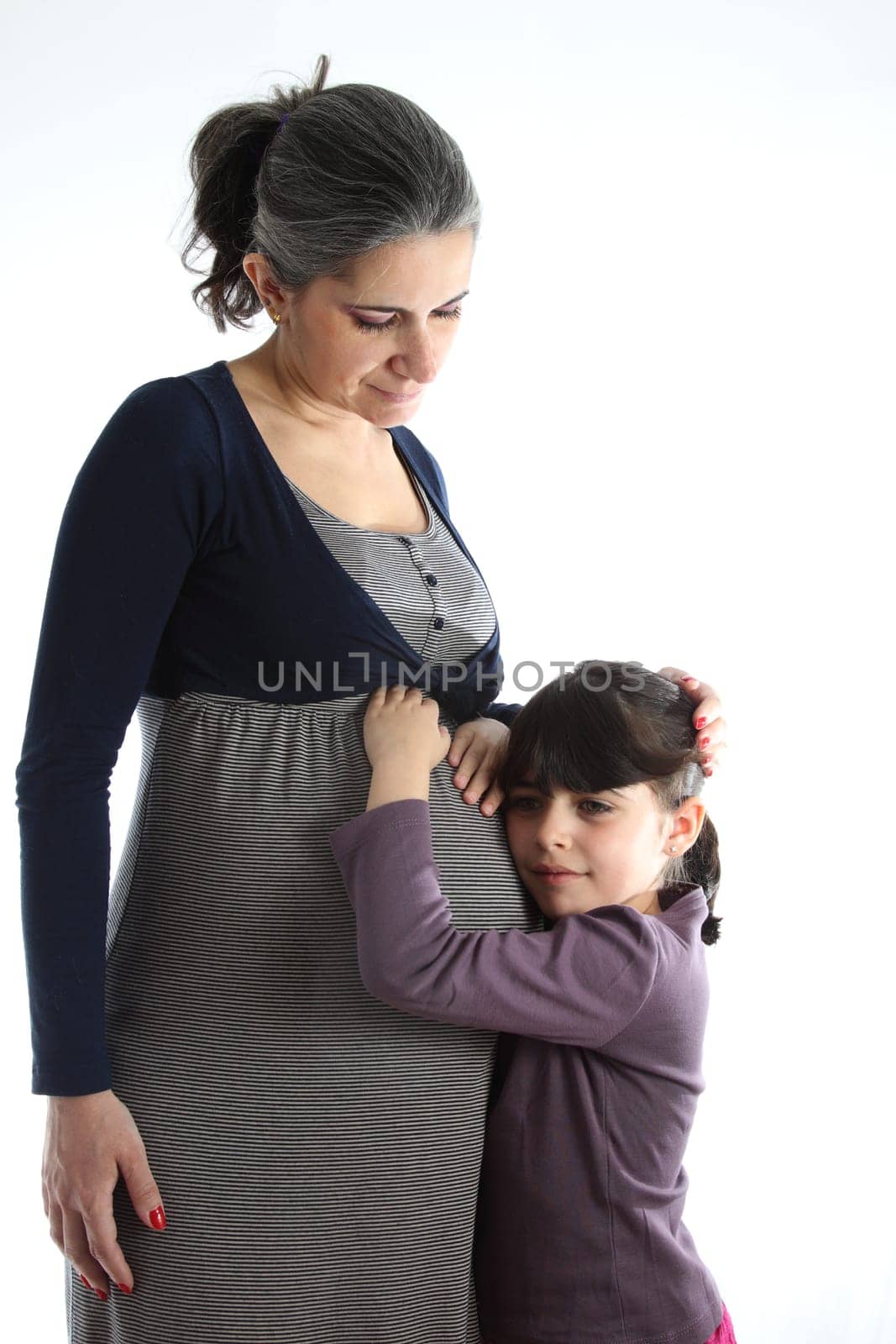 details of a Pregant woman with her girl isolated on white