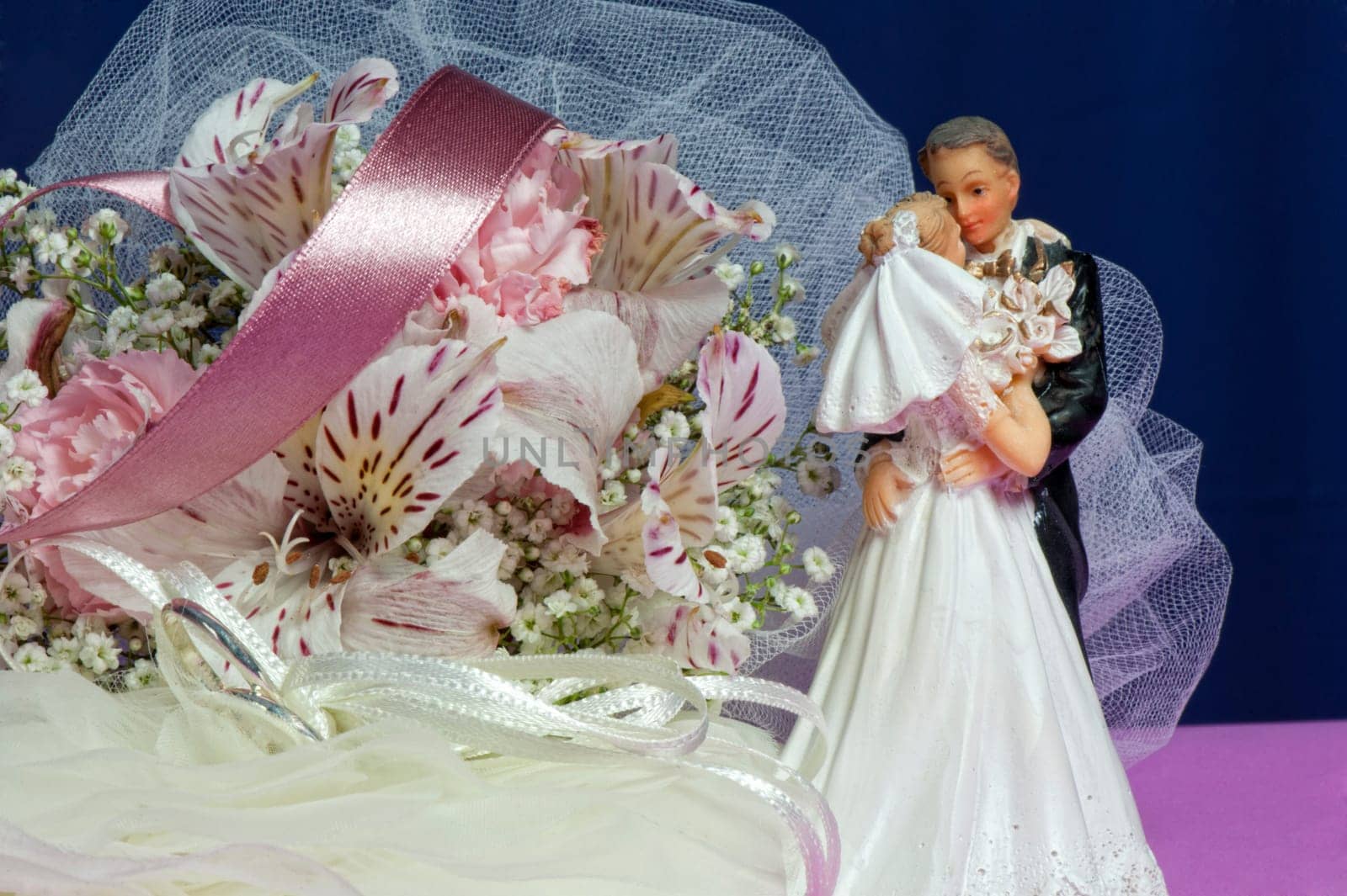 Arrangement with flowers and favors for wedding, baptism and First Communion