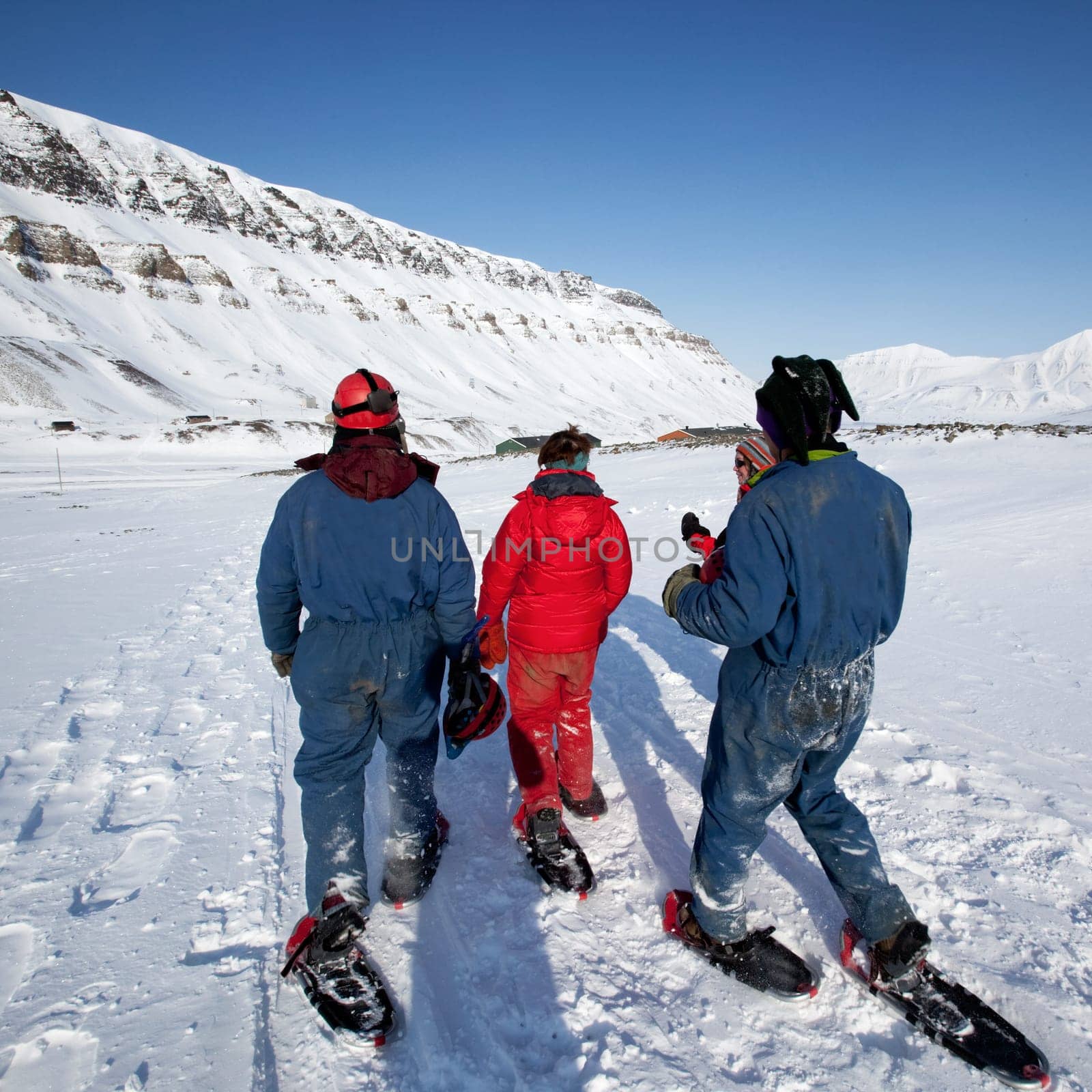 A group of tourists and a guide near Longyearbyen, Svalbard, Norway