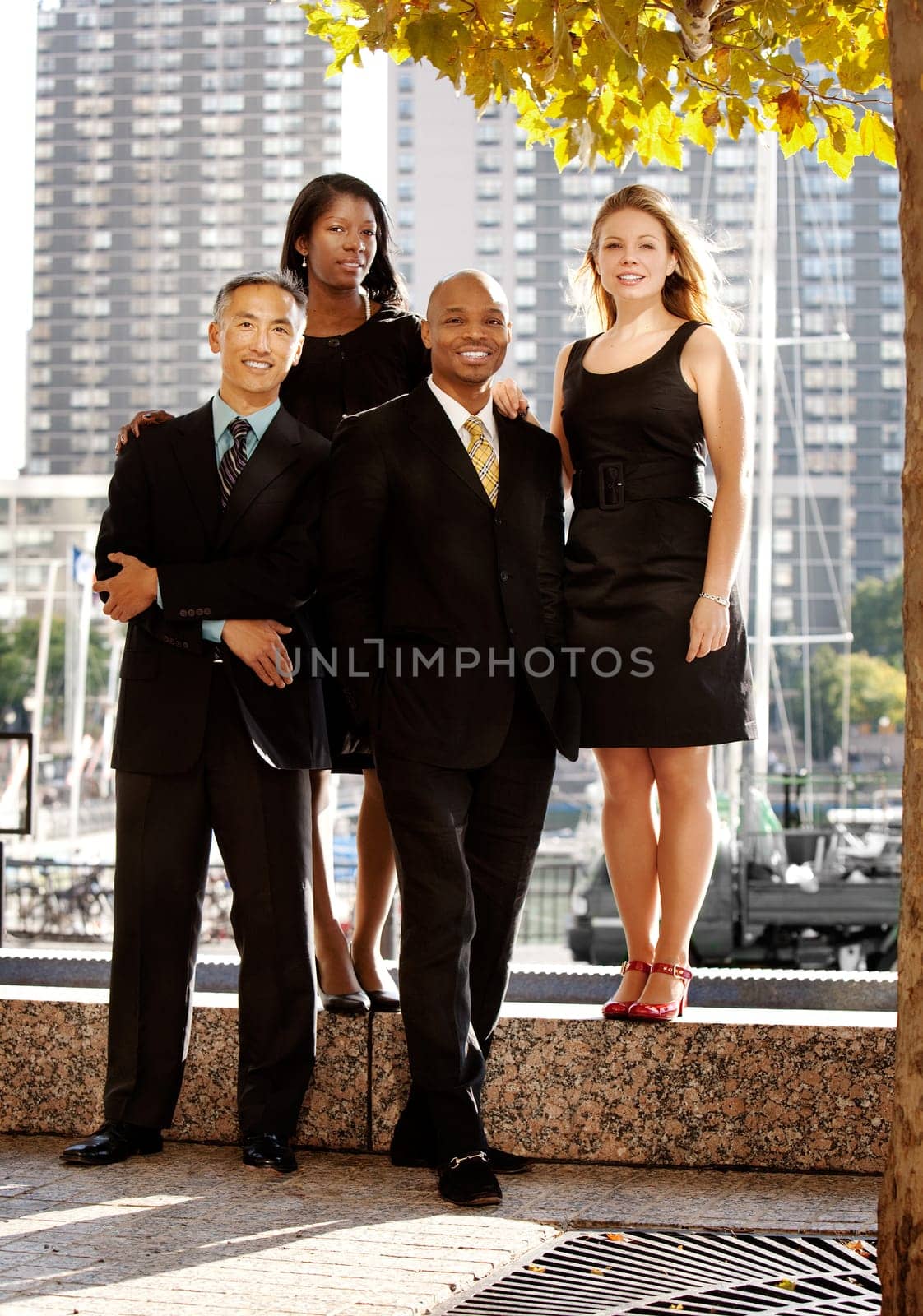 A business team portrait in an outdoor setting