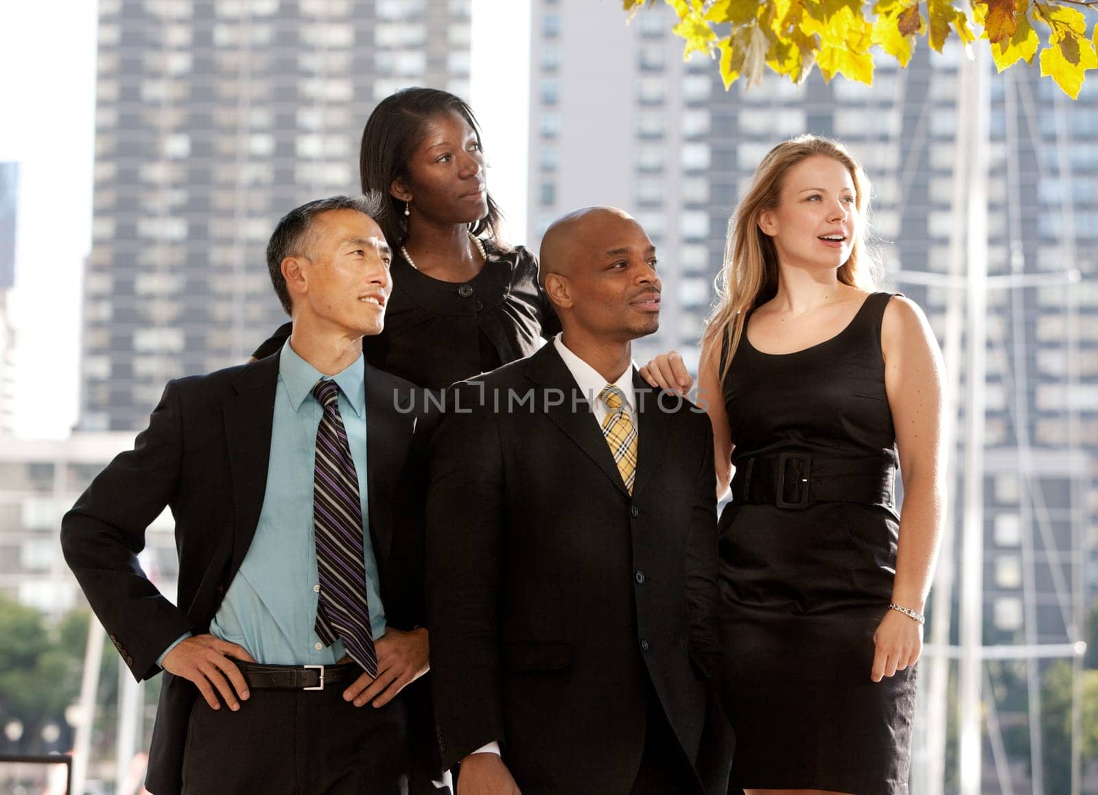 A business team looking to the side or into the distance