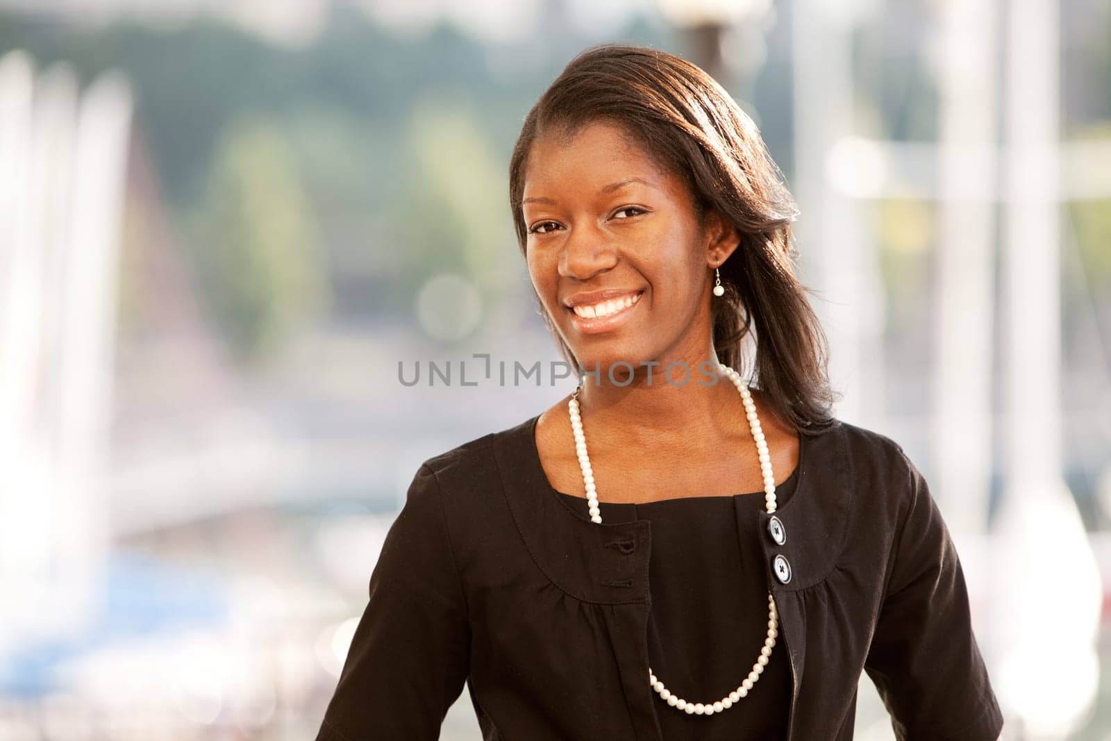 Portrait of mid adult business woman. Horizontally framed shot.
