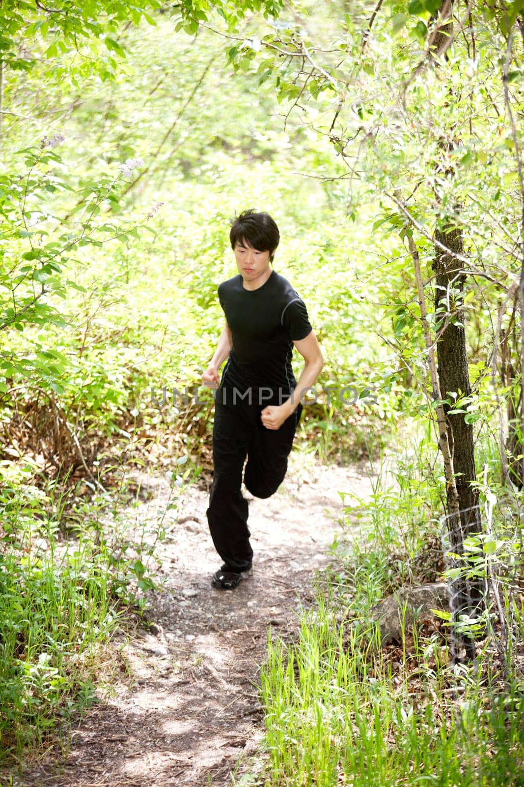 Man jogging during morning walk against blur background