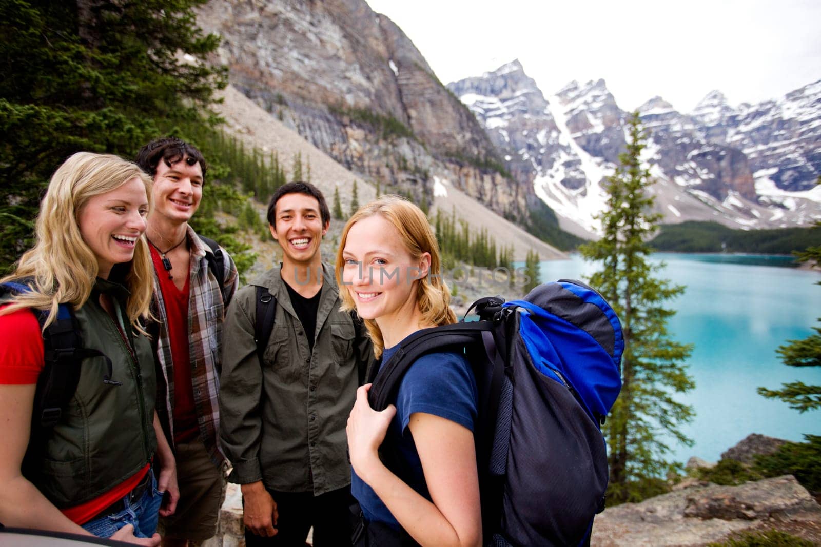 A group of friends on a hiking / camping trip in the mountains