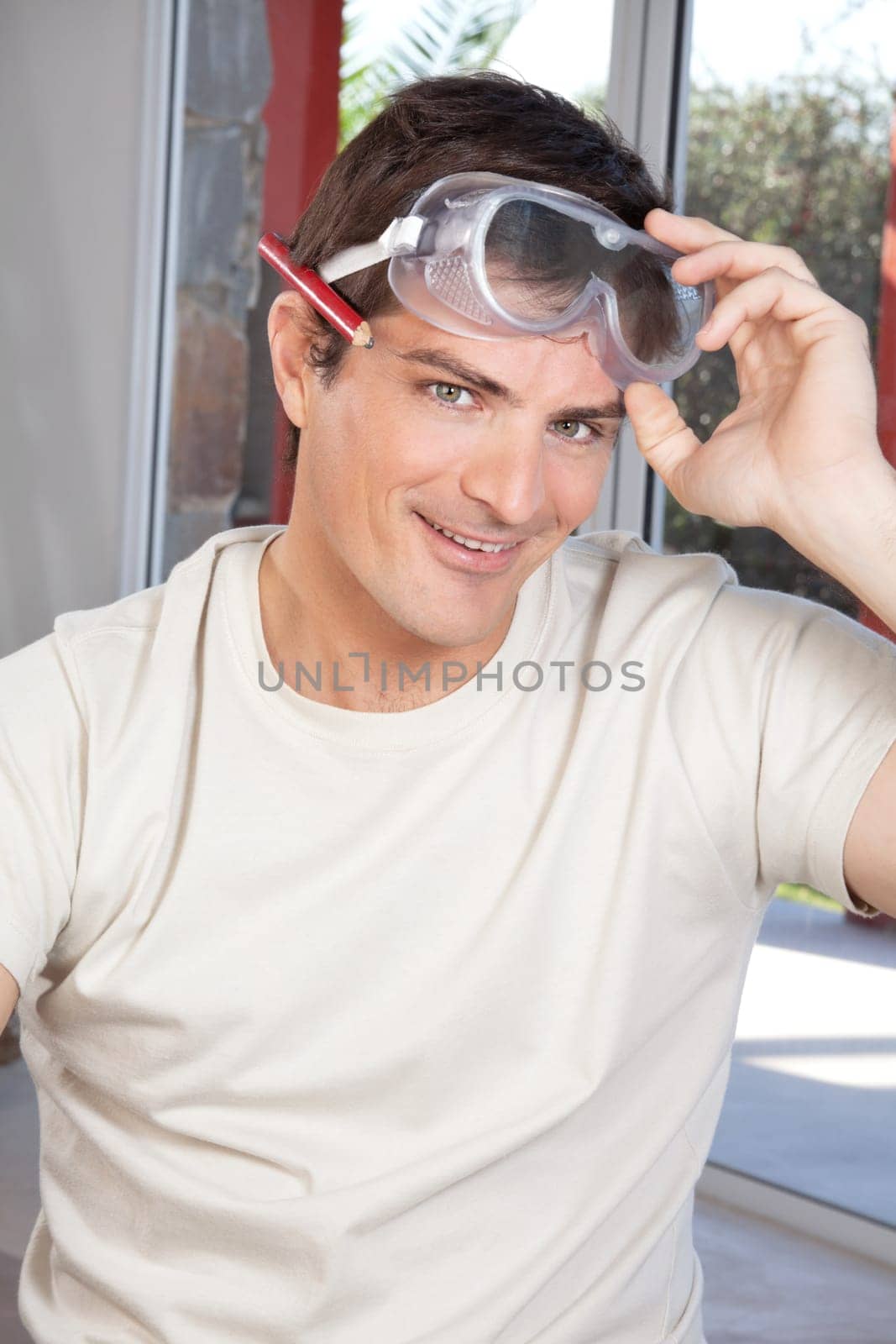 Portrait of an happy smiling man looking at camera