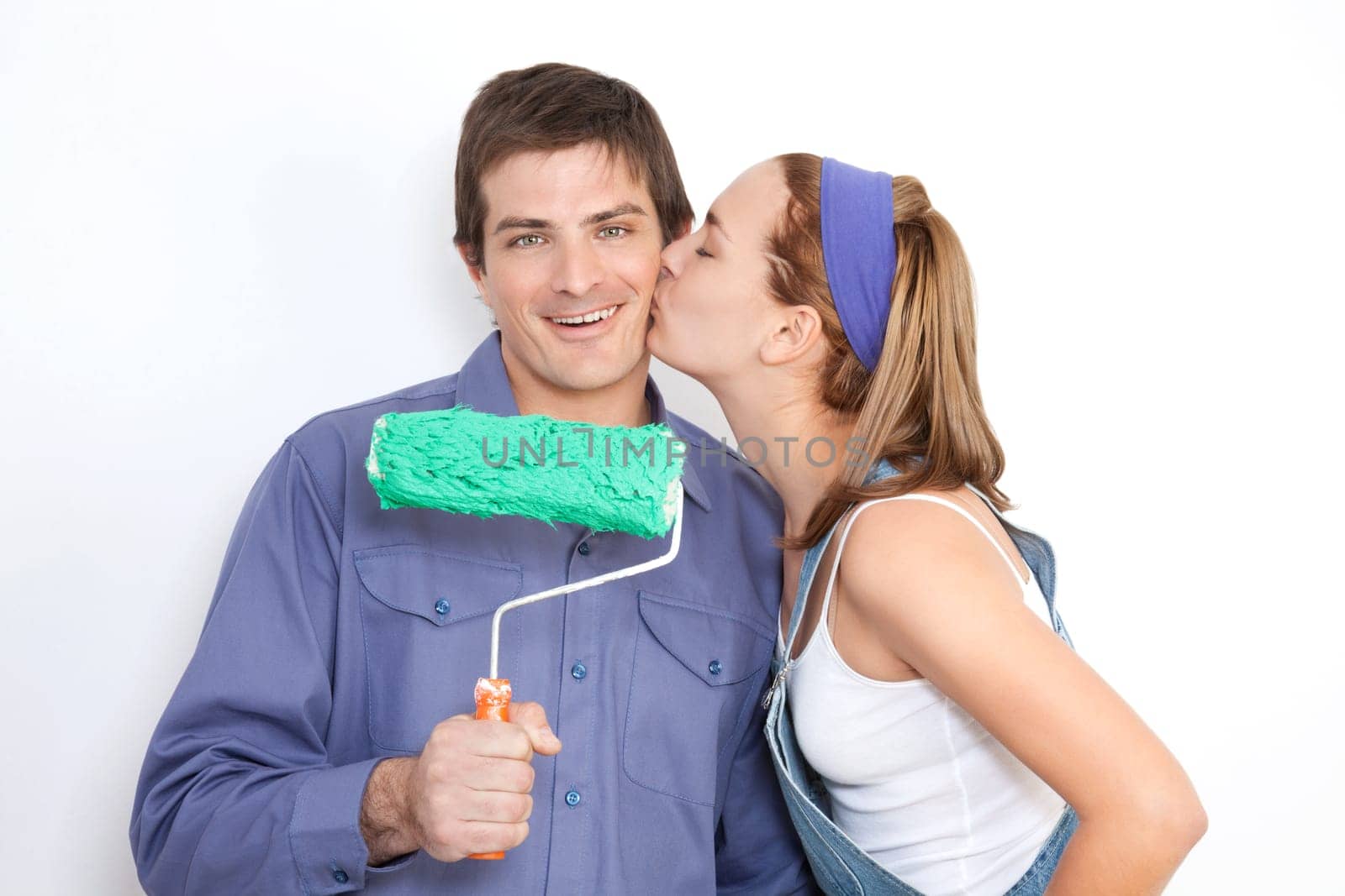Portrait of young wife kissing his husband