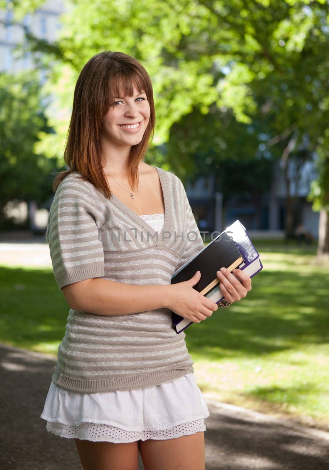 Happy university student looking at the camera