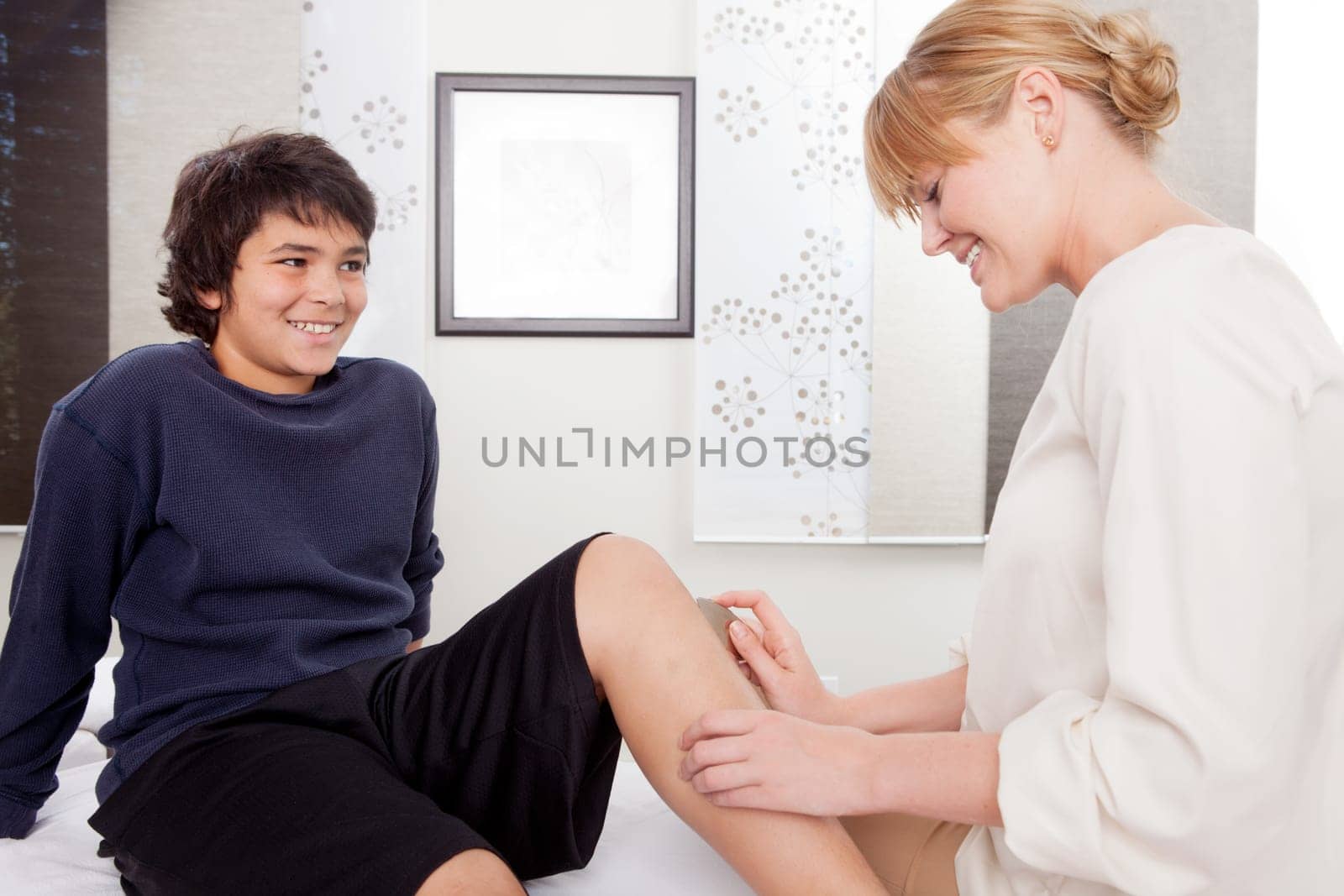 Young male at acupuncture clinic receiving Shoni-Shin treatment