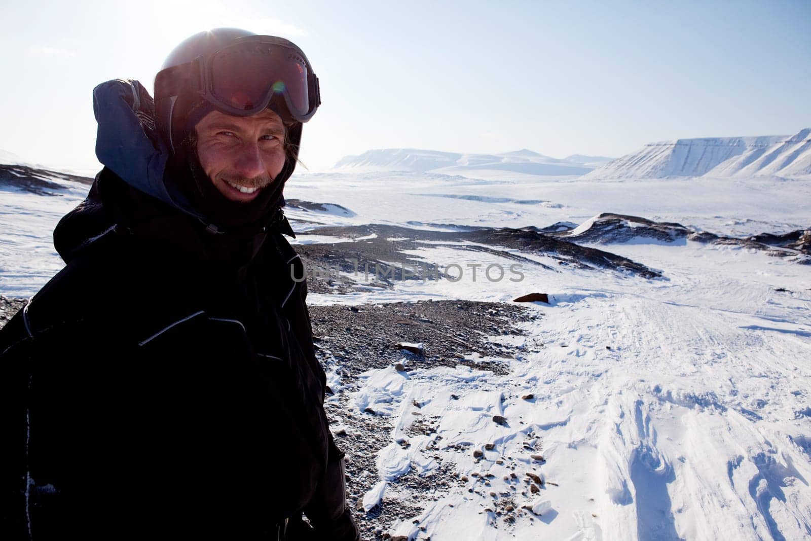 A winter adventure guide on a barren winter landscape