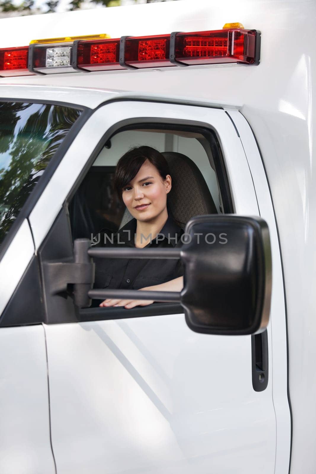 Portrait of a young EMT in an ambulance