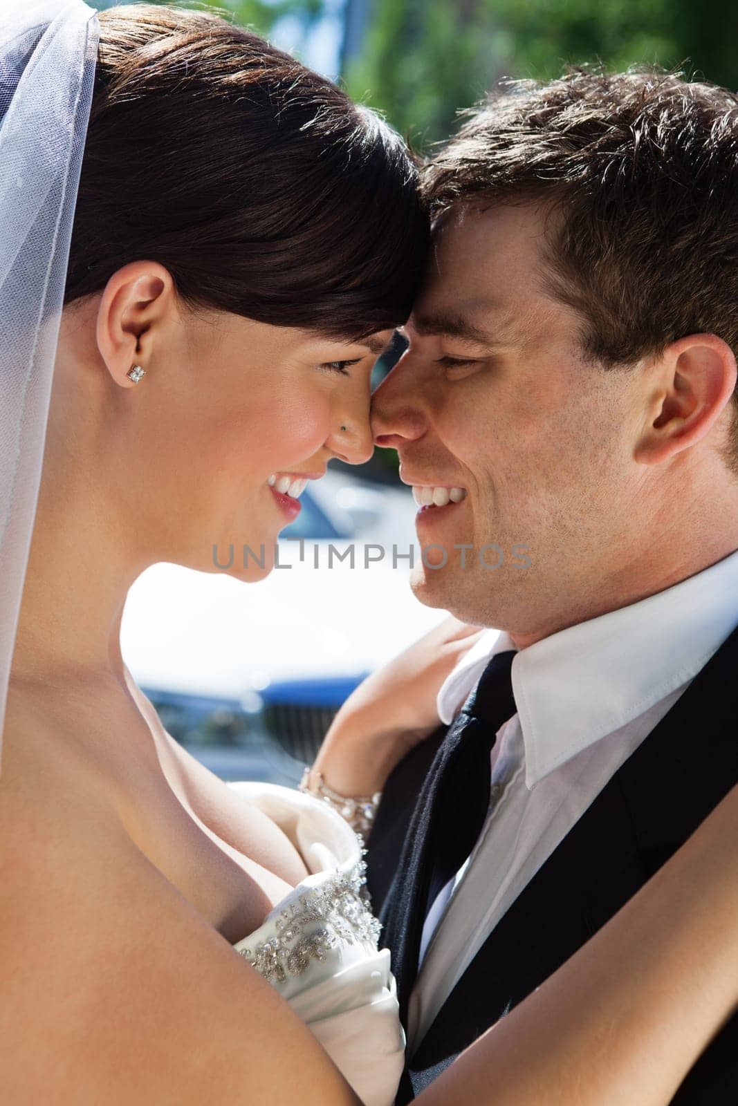 Happy wedding couple looking at each other