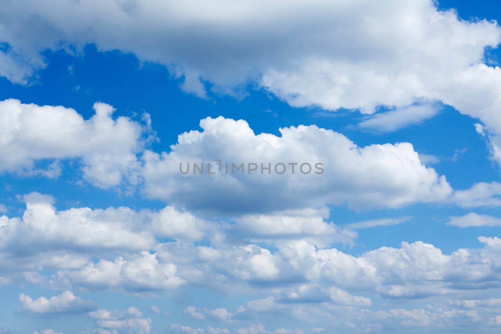 Cumulus clouds in the blue sky,can also be used as a background