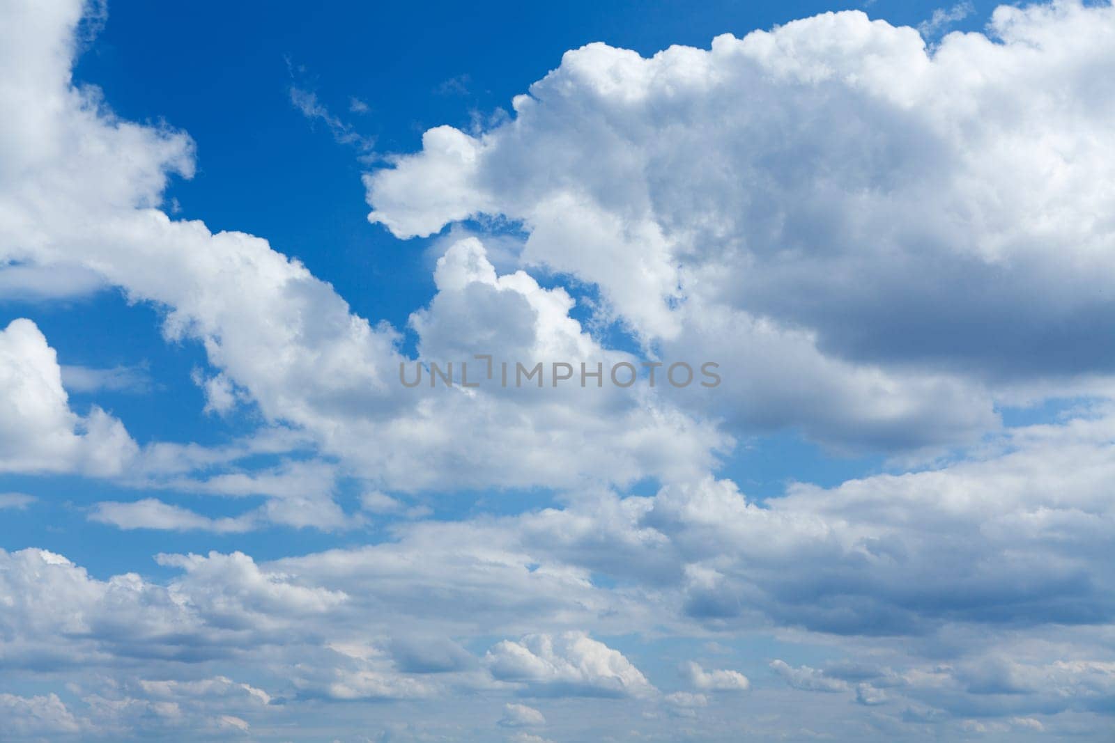 Cumulus clouds in the blue sky,can also be used as a background