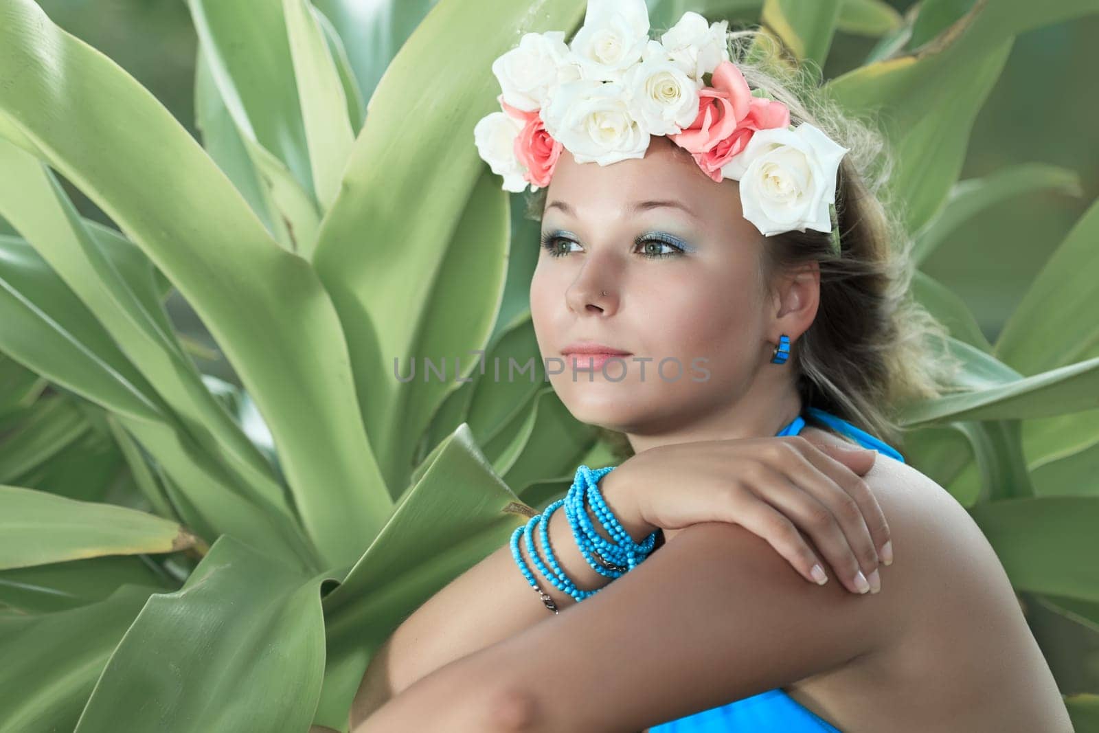 Portrait of a young woman with flowers