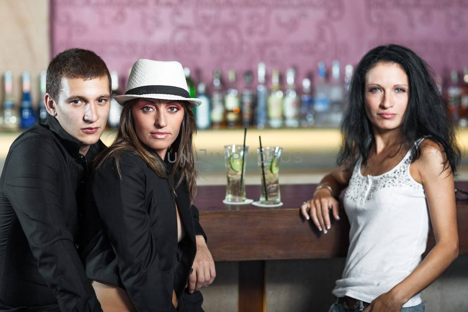 Fashion style photo of a people in the bar